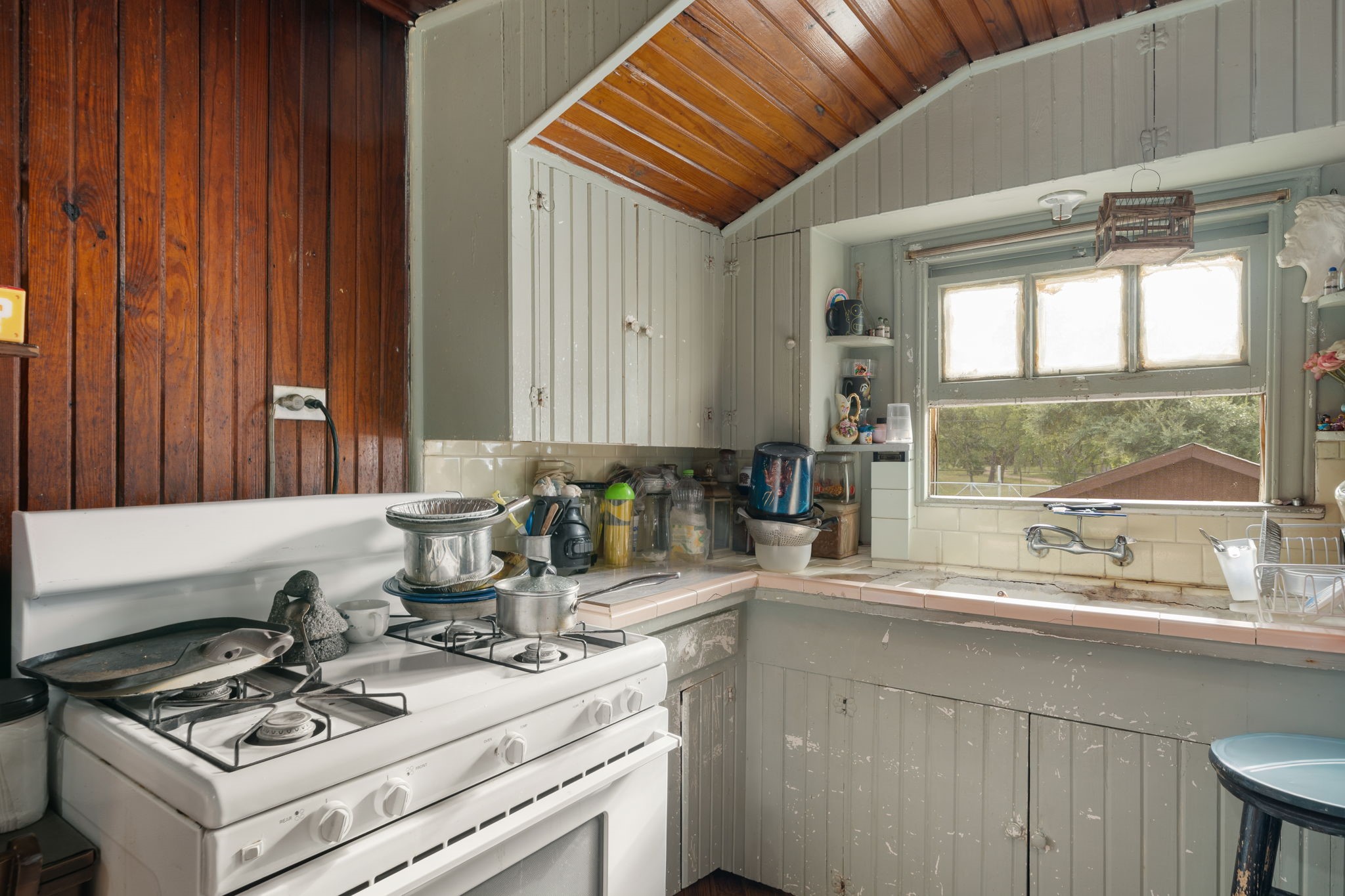 How darling is this space with a gas stove.