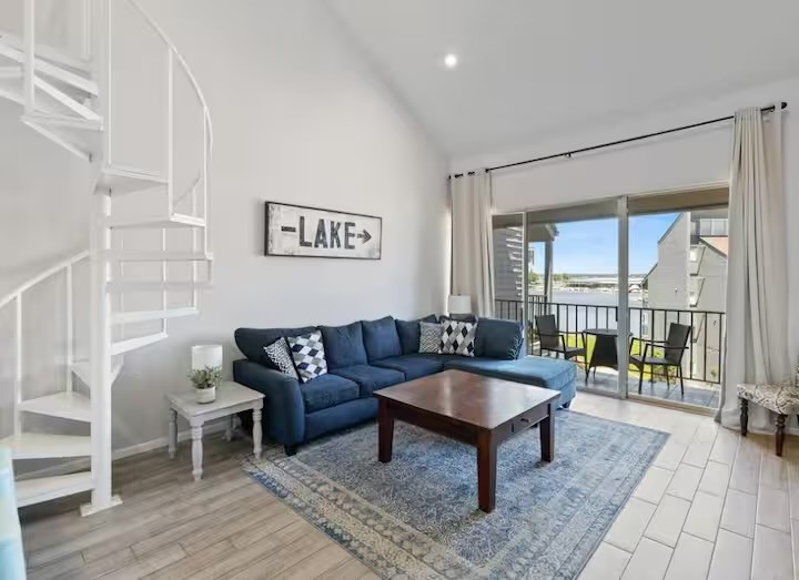Stylishly furnished living room is open and spacious