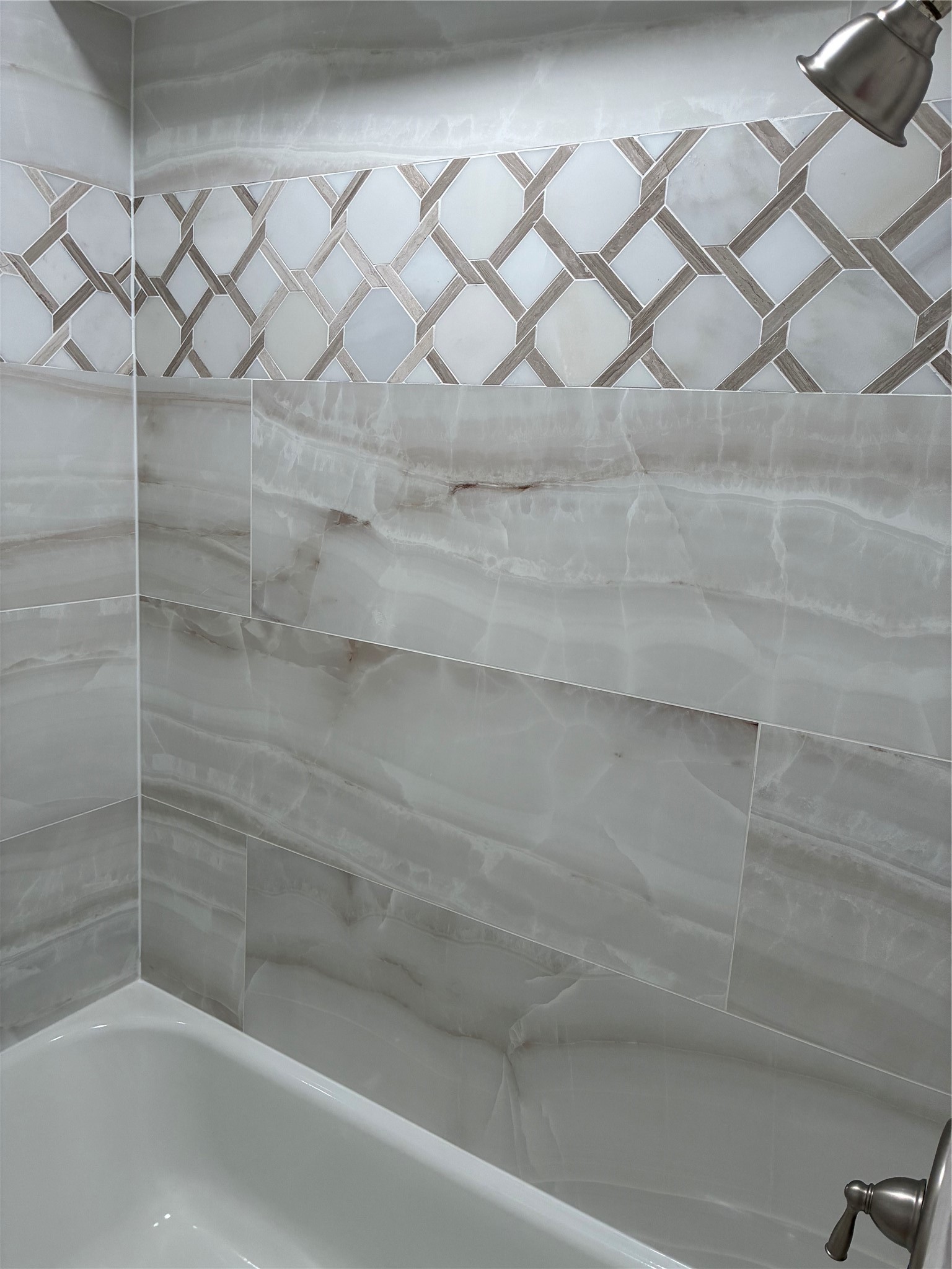 Updated bathroom with new tile.