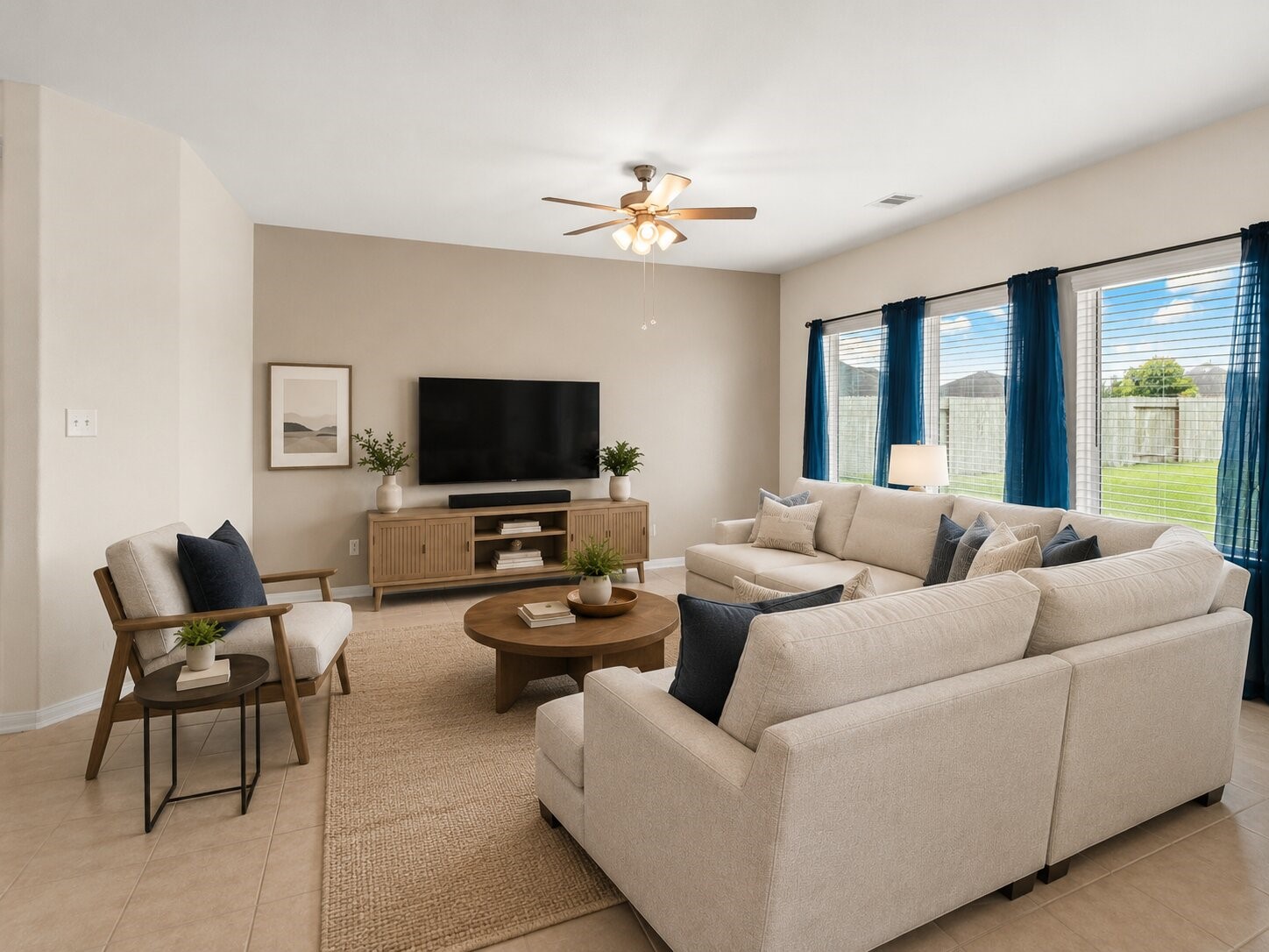 *virtually staged & painted* Another view of the living area with plenty of natural light.