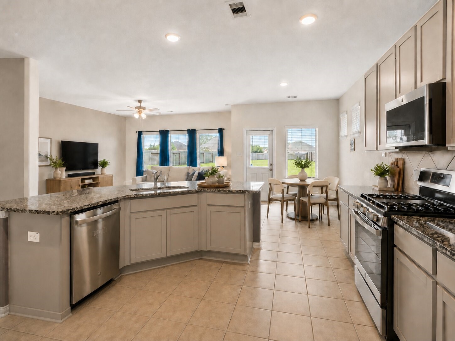 *virtually staged* The kitchen overlooks the living area, making it easy to cook, entertain, and stay connected.