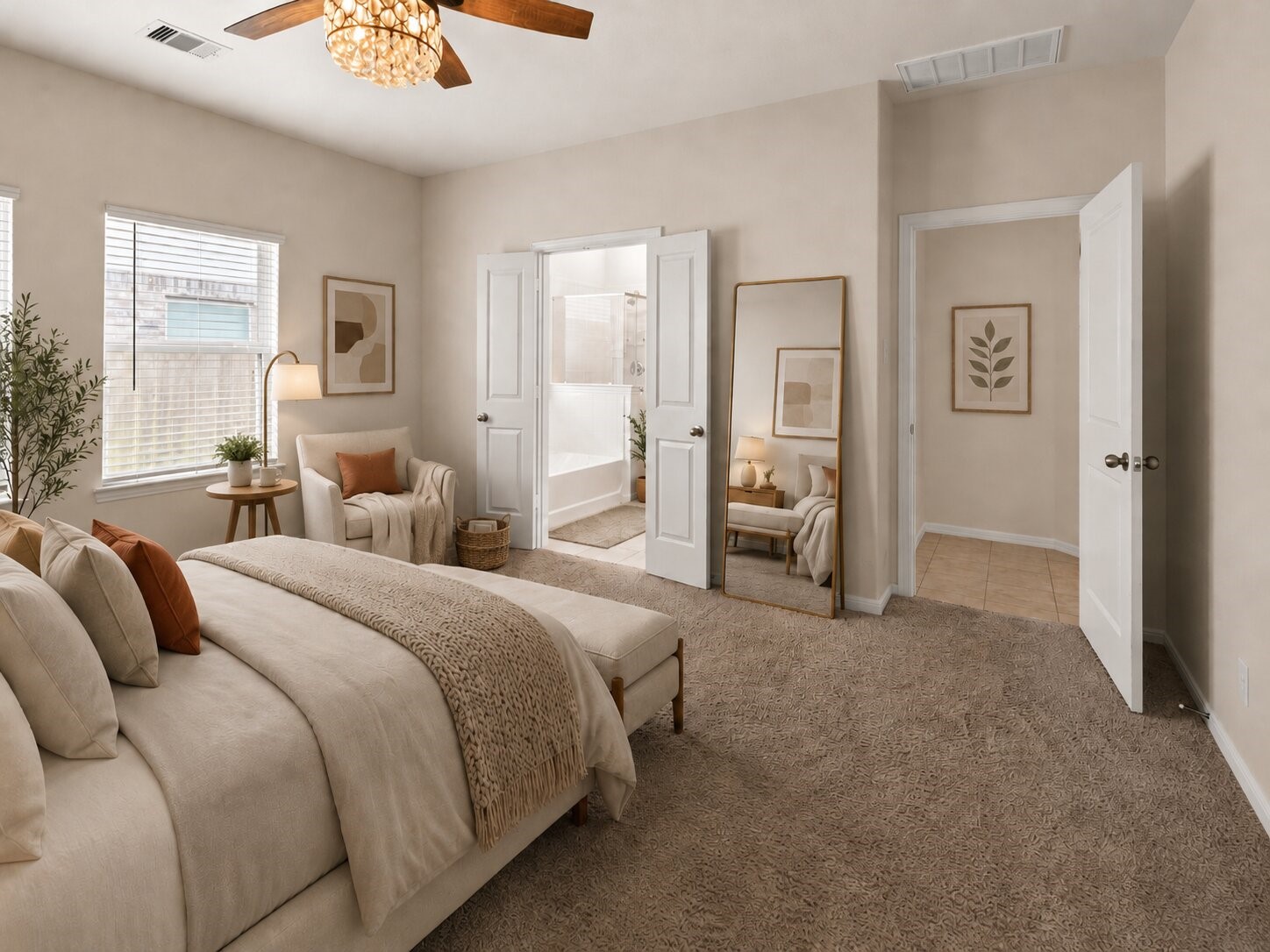 *virtually staged* Another view of the primary suite highlights the natural light and gives you a peek into the primary bathroom.