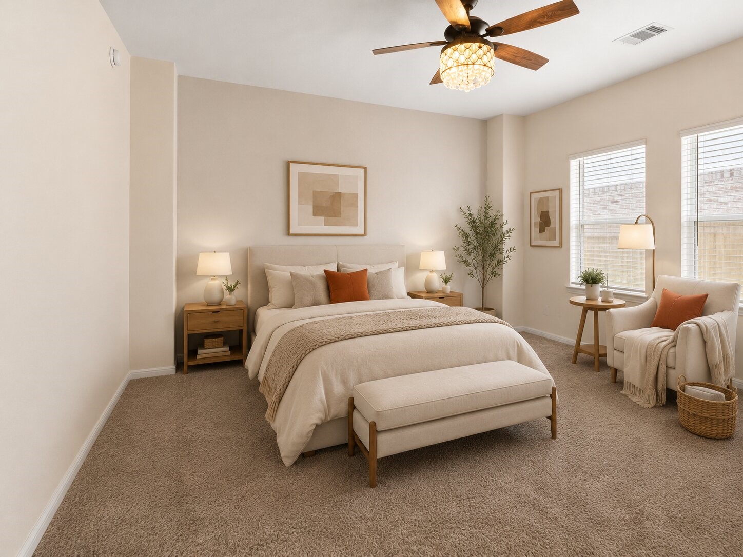 *virtually staged & painted* The spacious downstairs primary suite offers room for a full bedroom set and a relaxing sitting area.