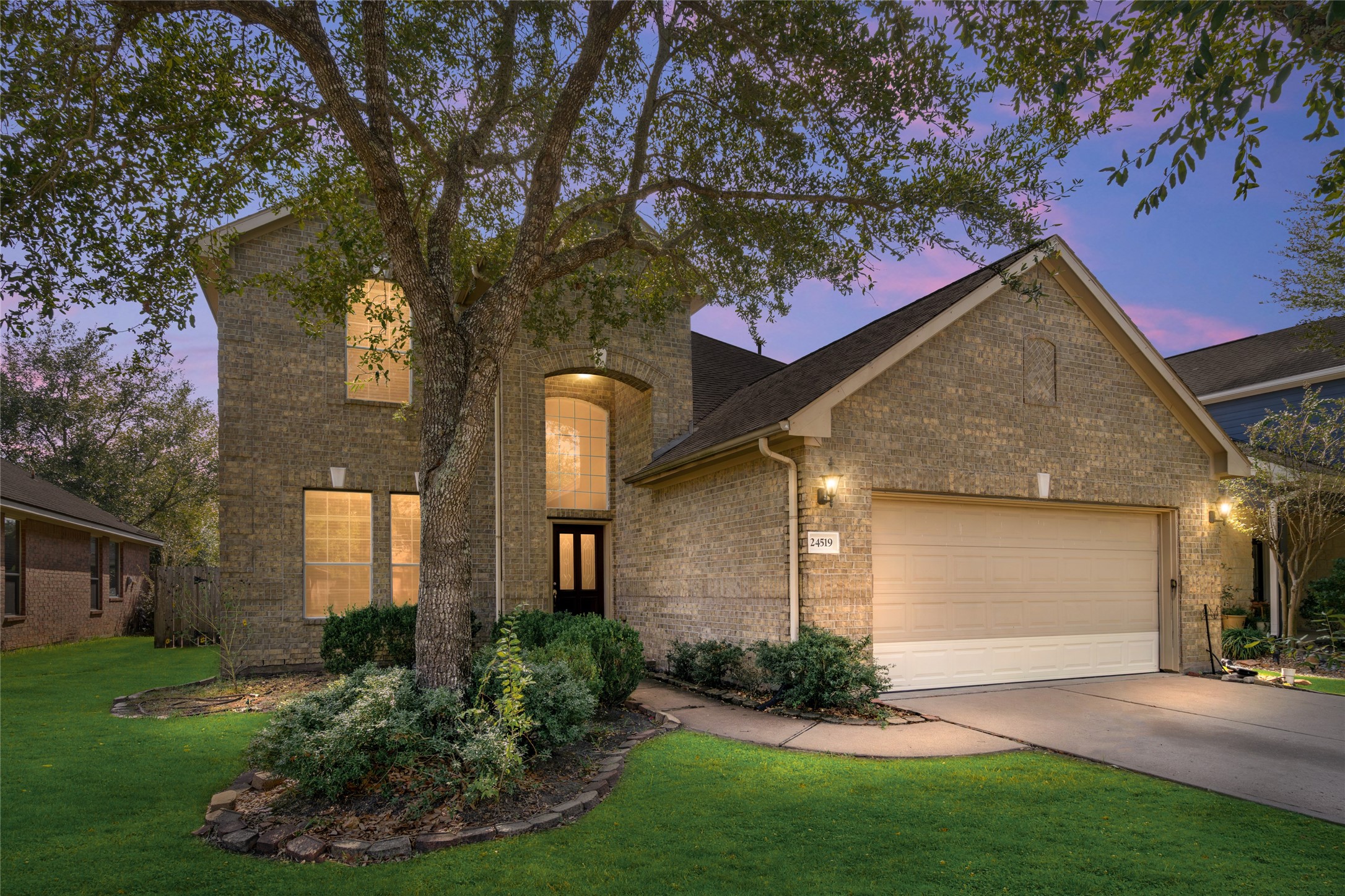 Charming brick-front home with mature trees, established landscaping, and a welcoming arched entry. The attached two-car garage and attractive curb appeal create a strong first impression. Charming brick-front home with mature trees, established landscaping, and a welcoming arched entry. The attached two-car garage and attractive curb appeal create a strong first impression.