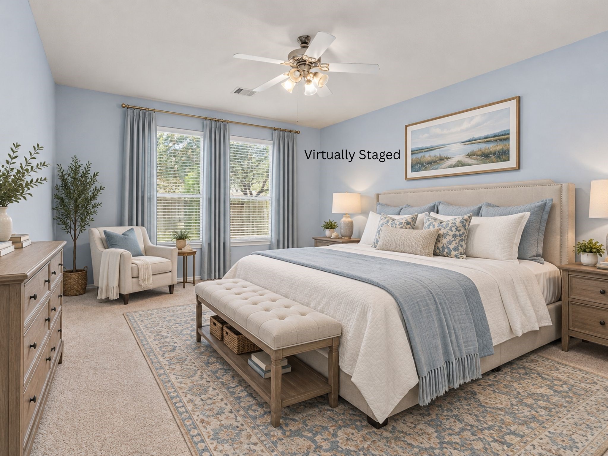Virtually staged primary bedroom showcasing the room's generous proportions, soft carpeting, ceiling fan, and multiple windows. The space offers a comfortable retreat with room for a full bedroom arrangement and a relaxing atmosphere.