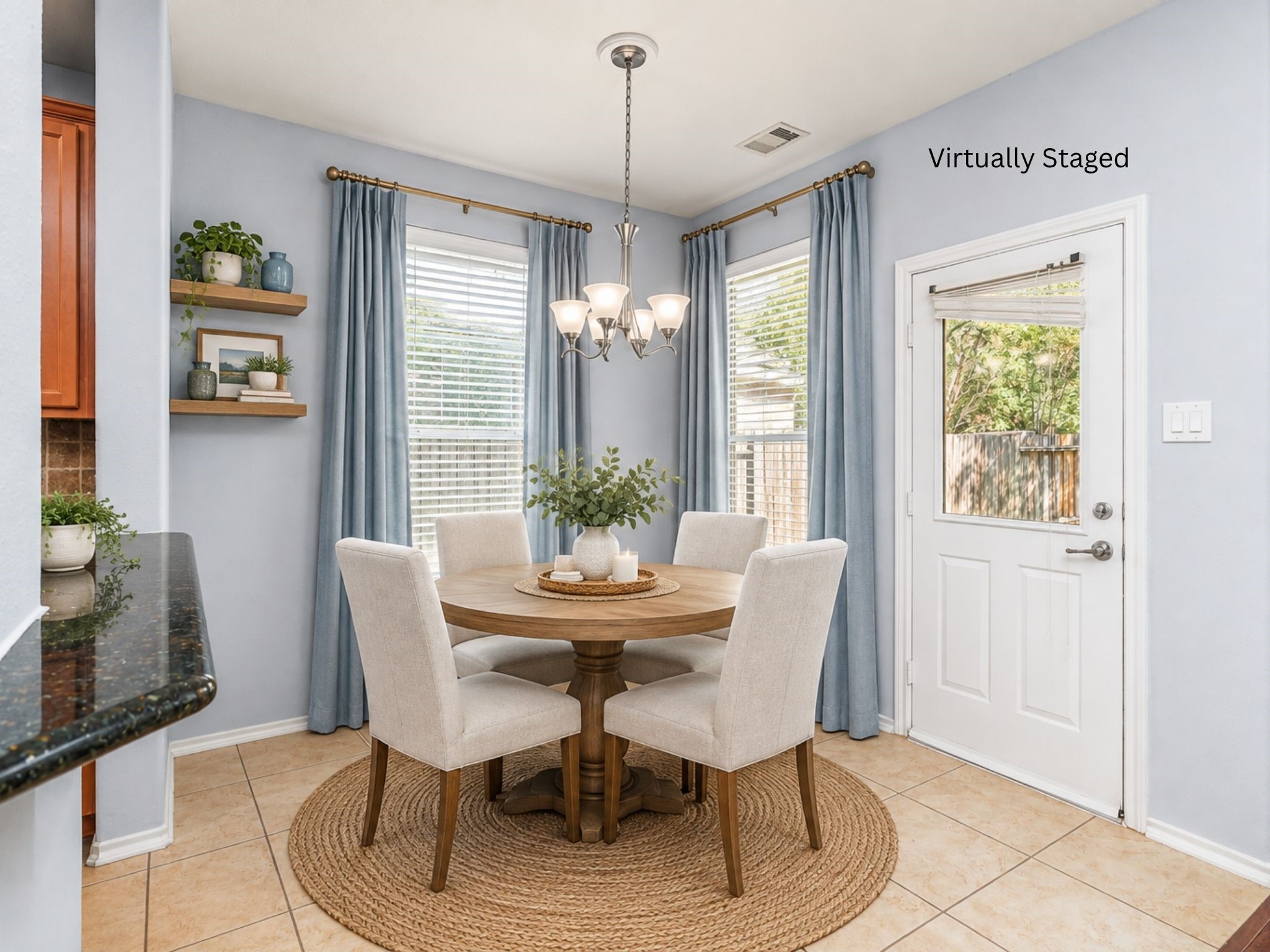 Virtually staged breakfast area featuring large windows and a nearby exterior door that brings in natural light. The defined dining space offers a comfortable spot for everyday meals with convenient access to the backyard. Virtually staged breakfast area featuring large windows and a nearby exterior door that brings in natural light. The defined dining space offers a comfortable spot for everyday meals with convenient access to the backyard.