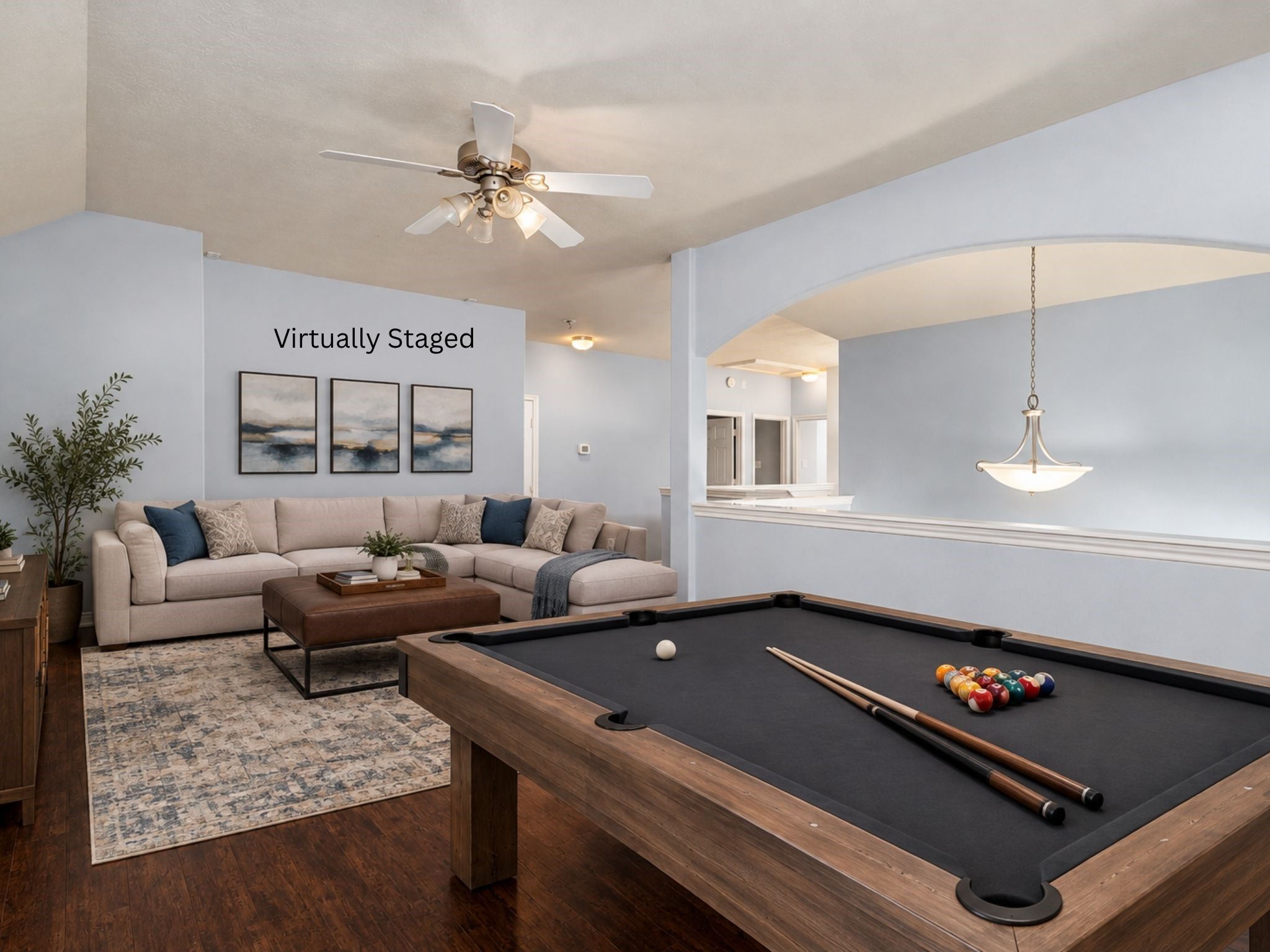 Virtually staged second-floor game room featuring wood flooring and an open layout arranged for recreation and entertaining. The room offers a dedicated space for games, hobbies, movie nights, or a casual gathering area away from the main living room. Virtually staged second-floor game room featuring wood flooring and an open layout arranged for recreation and entertaining. The room offers a dedicated space for games, hobbies, movie nights, or a casual gathering area away from the main living room.