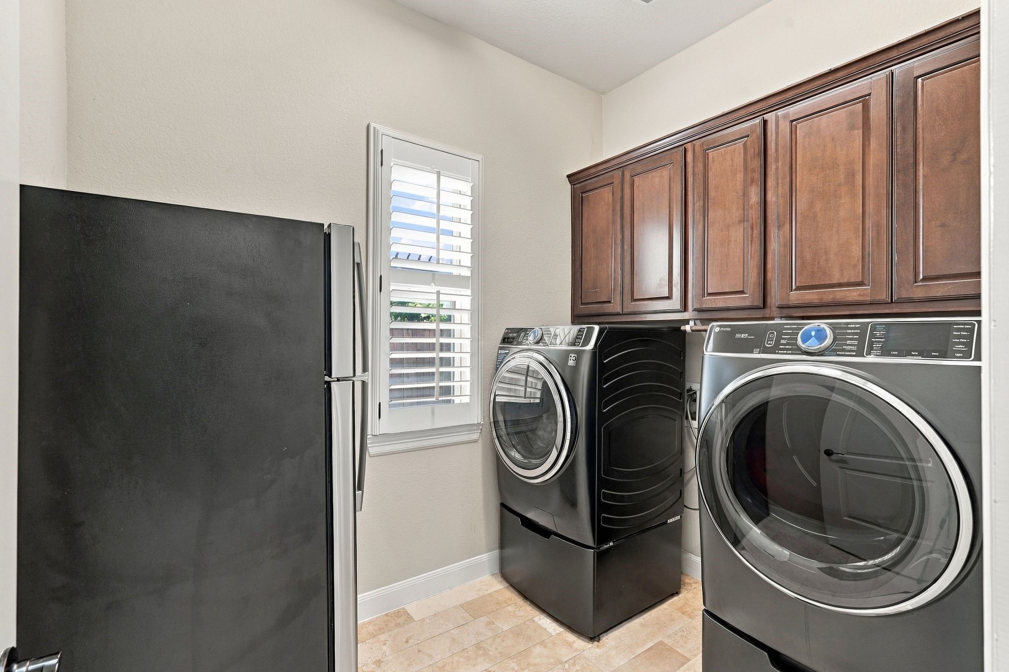 Massive laundry room with plenty of storage!