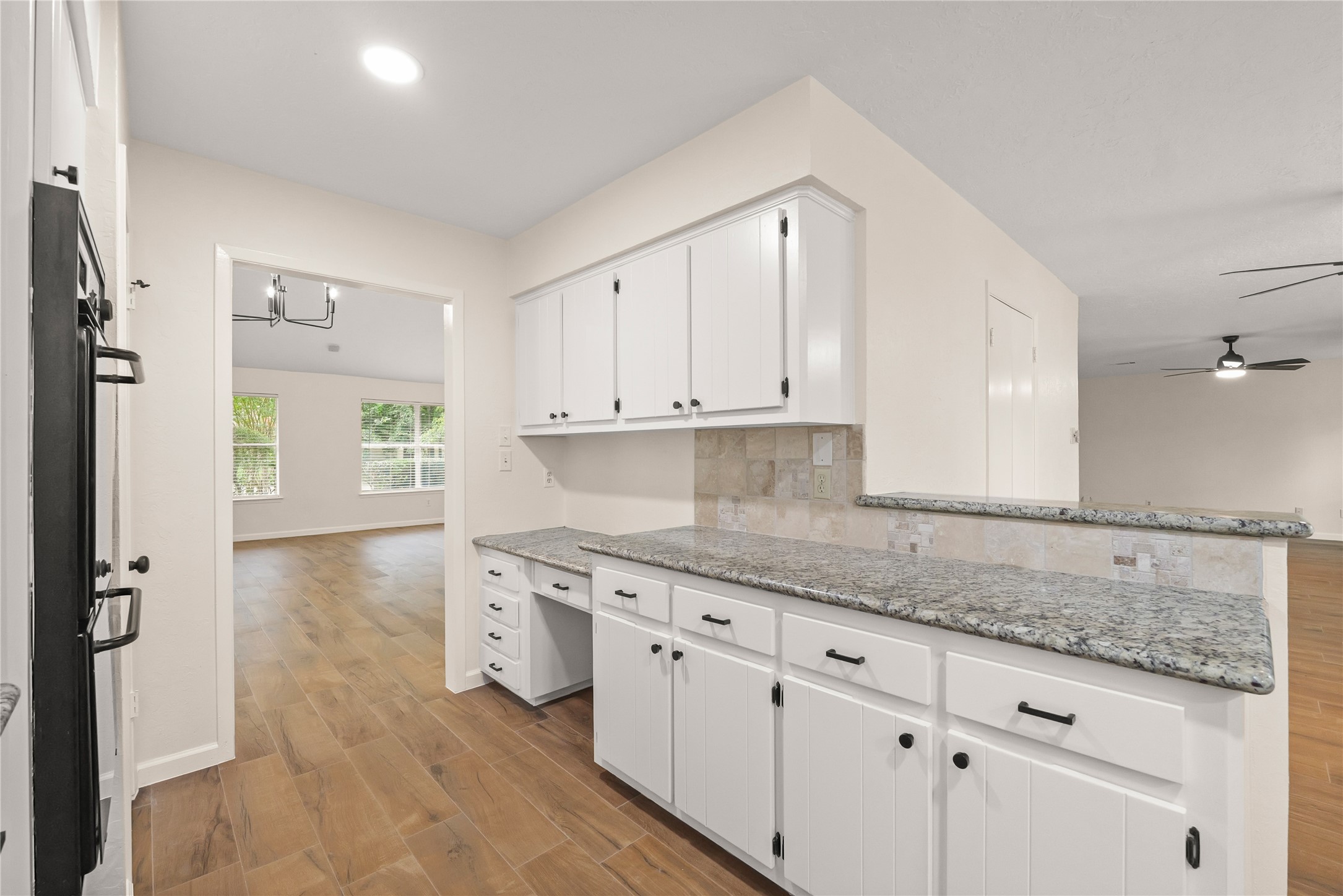 Spacious kitchen with granite countertops