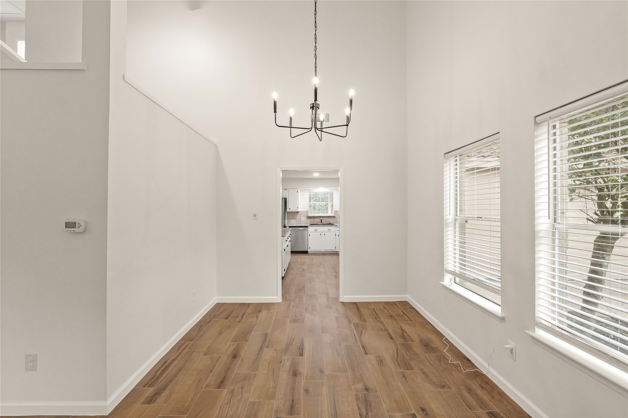 Formal dining area leading to kitchen