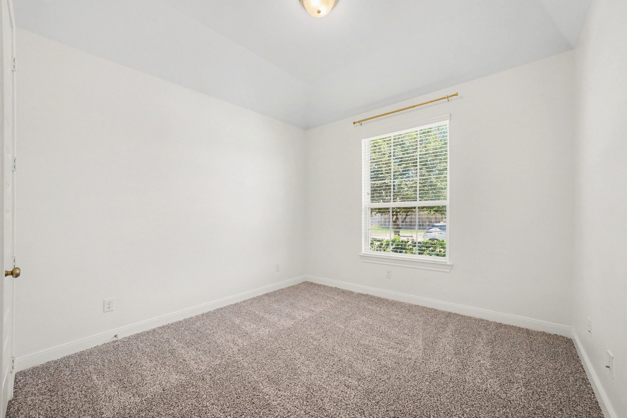 Guest bedroom 2 with newly installed carpet