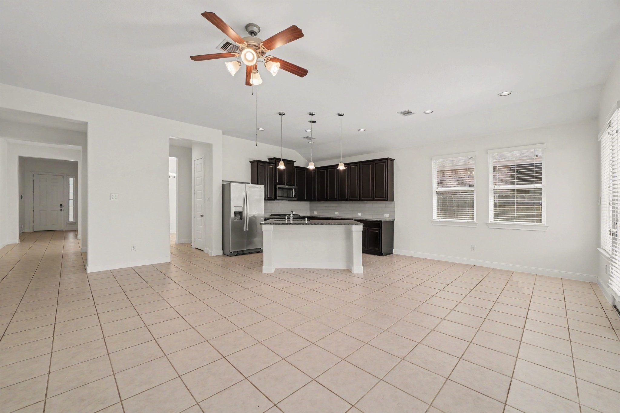 Large breakfast area open to the kitchen and living room making this a perfect space to entertain