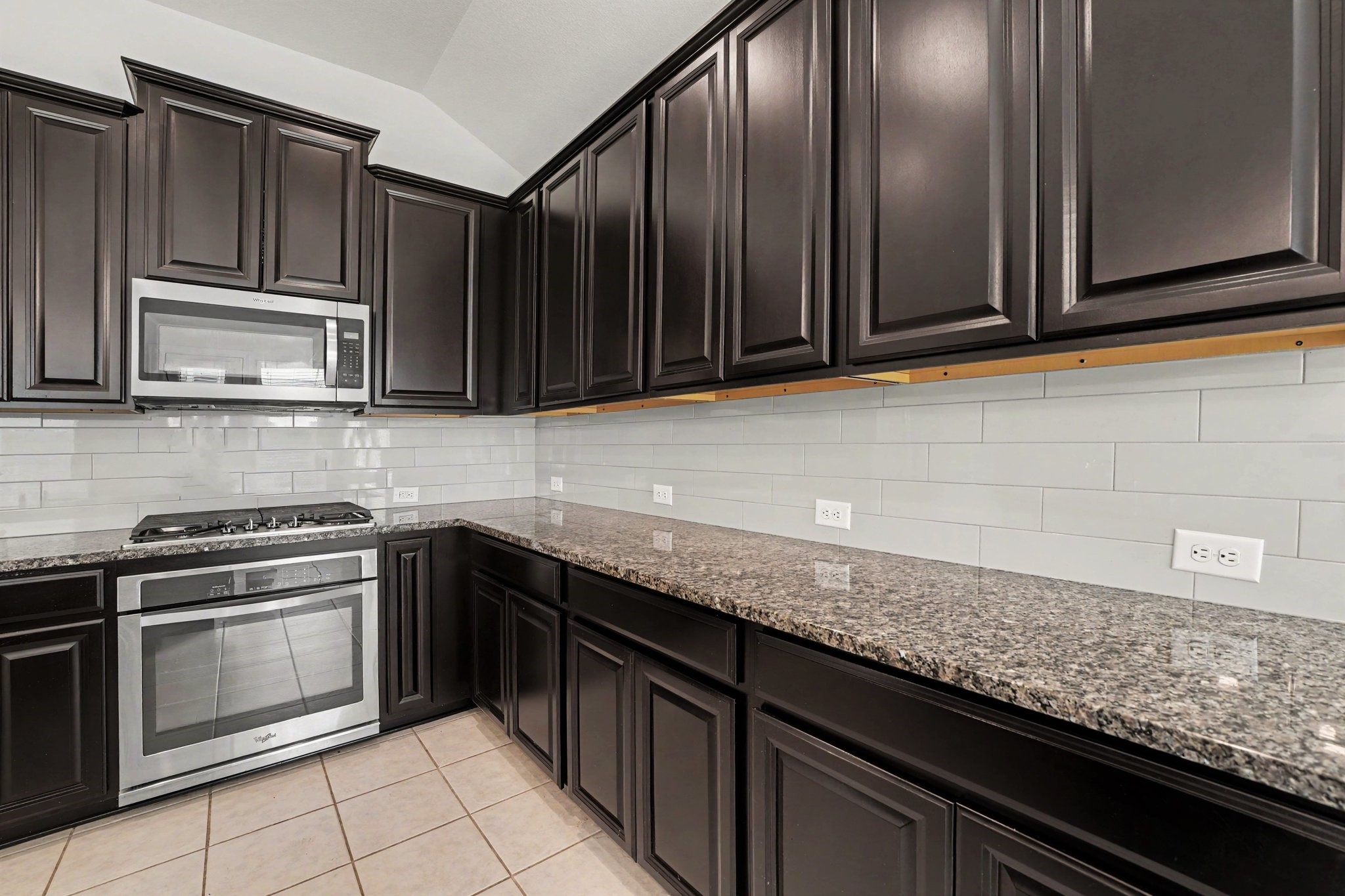 Stainless Steel appliances including Gas range, eclectic oven, built-in microwave and dishwasher