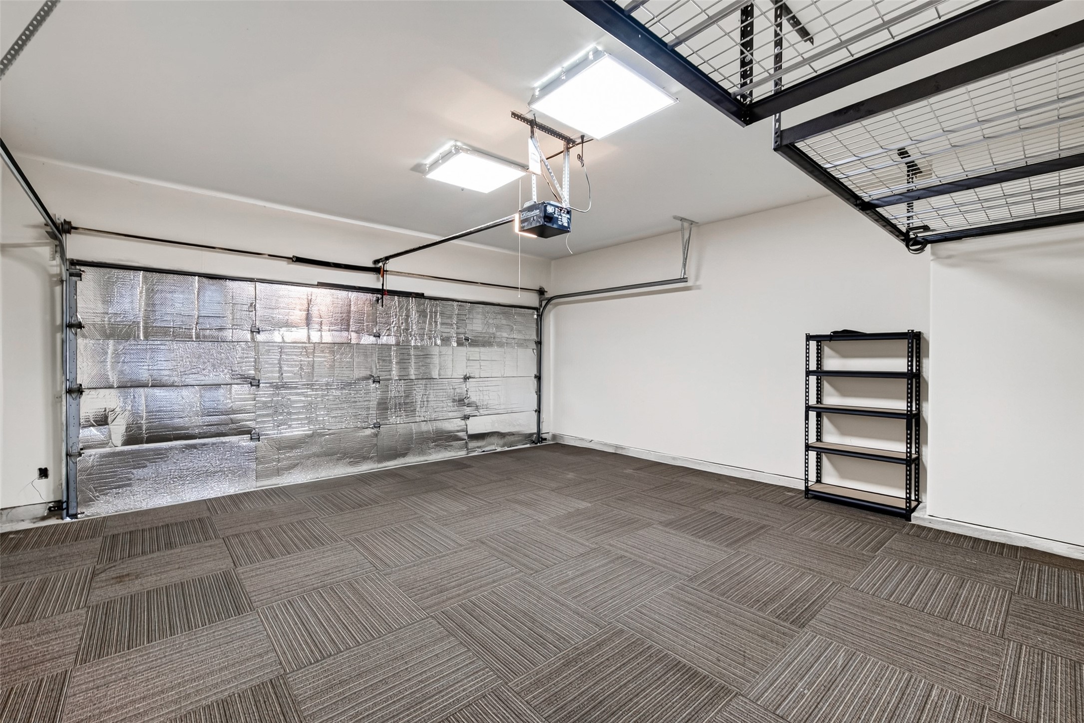 The two-car garage has a ton of extra storage.