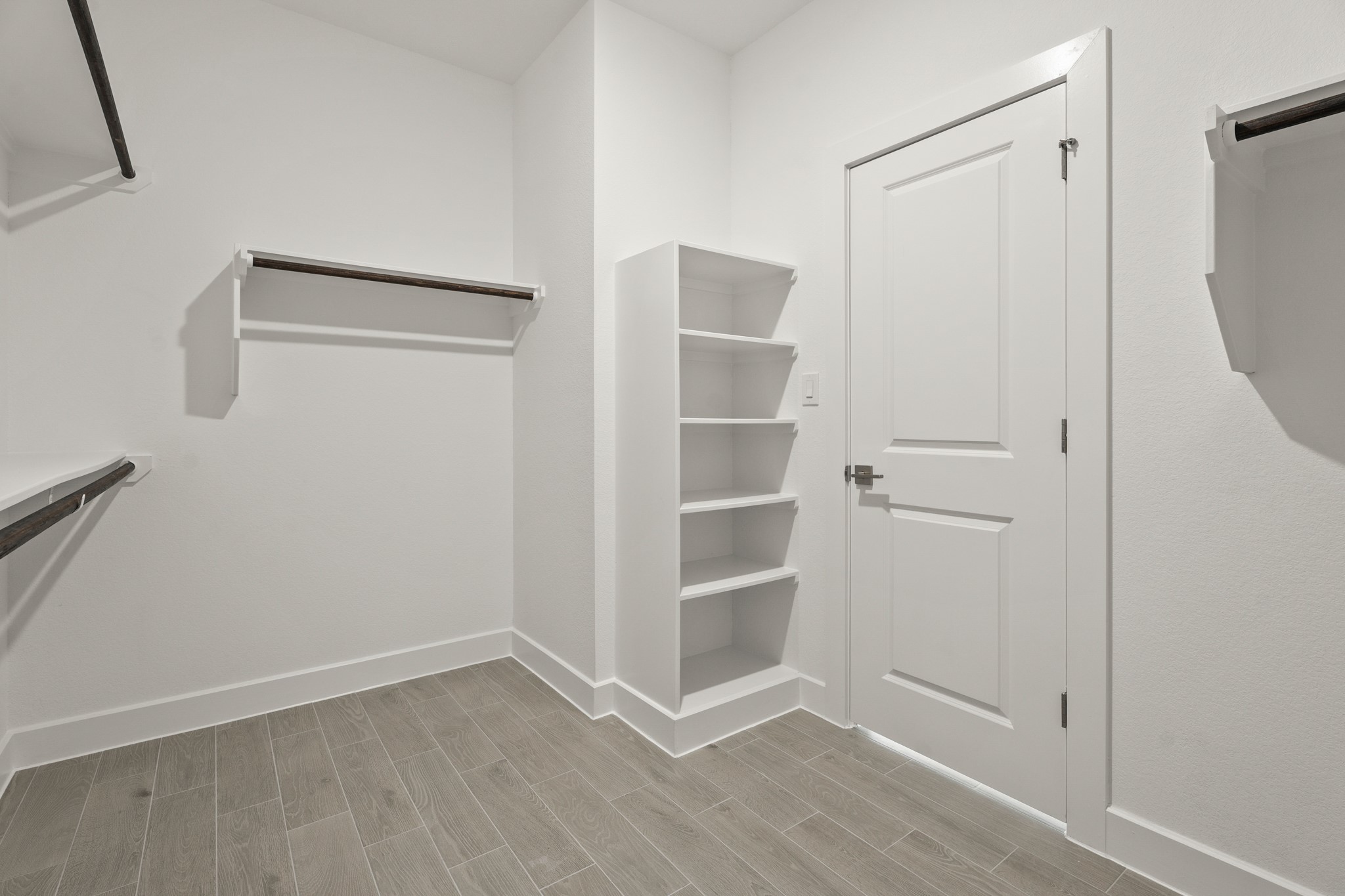 Primary walk-in closet (*Photo not of actual home and used for illustration purposes only.)