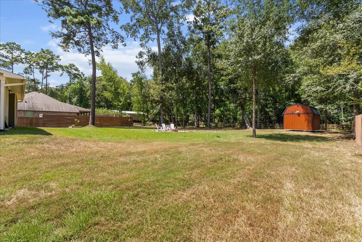 Mature trees and an impressive amount of open yard give you the country feel you've been looking for.