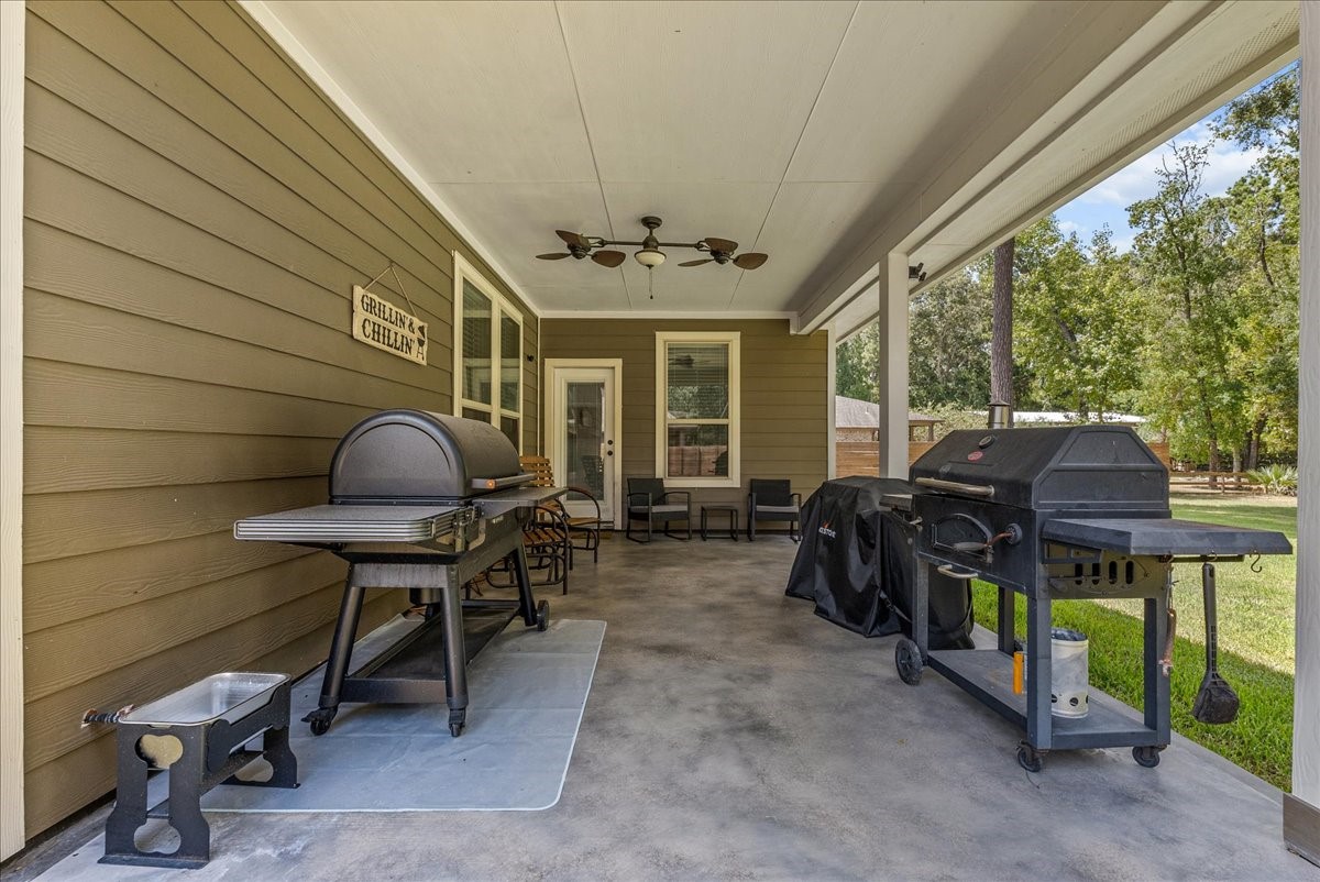 Spacious covered patio provides plenty of room for outdoor dining, grilling and relaxing with friends and family.