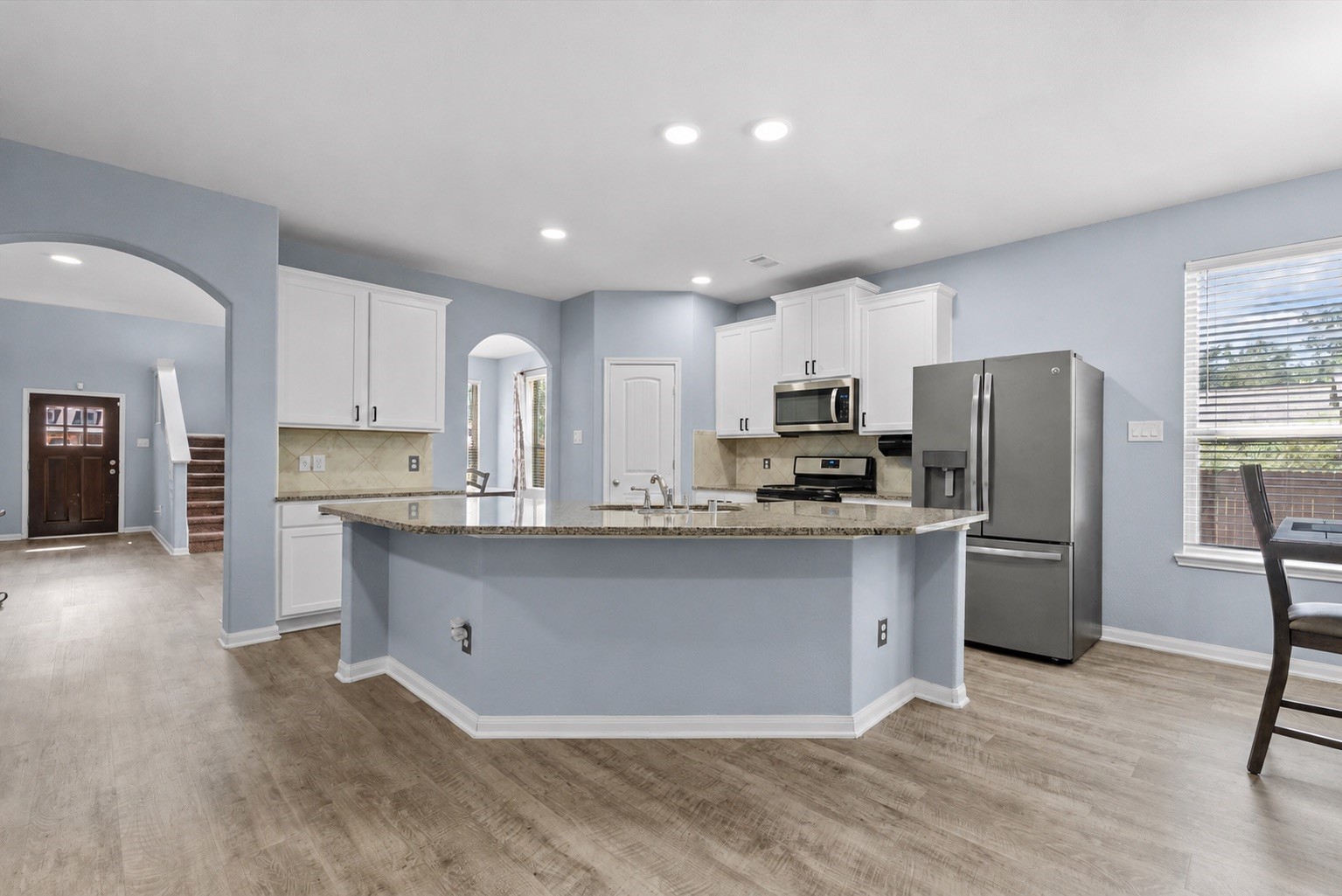 Step inside to a bright, open-concept kitchen designed for everyday living and easy entertaining.