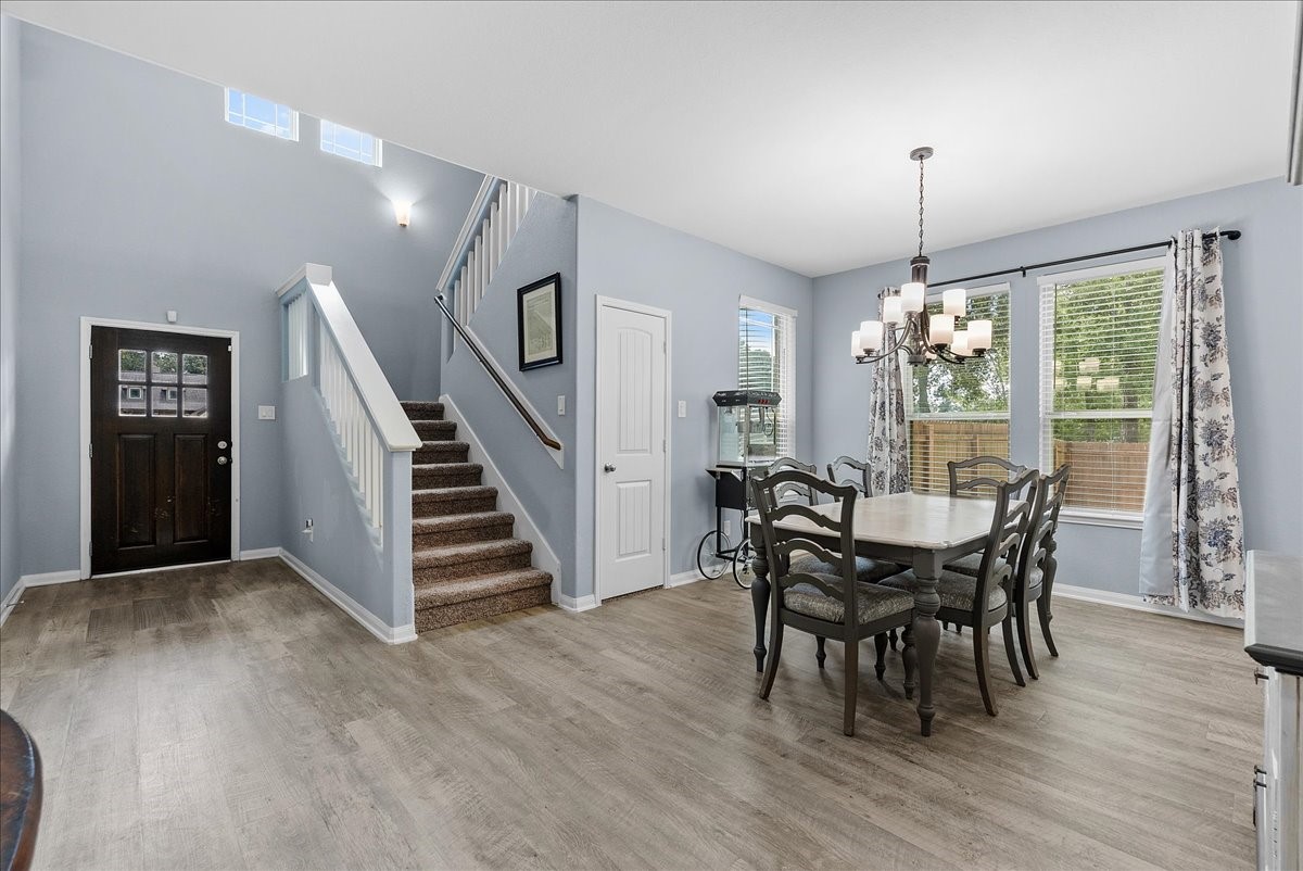A welcoming entry opens to a bright dining area and an easy-flowing floor plan that immediately feels like home.
