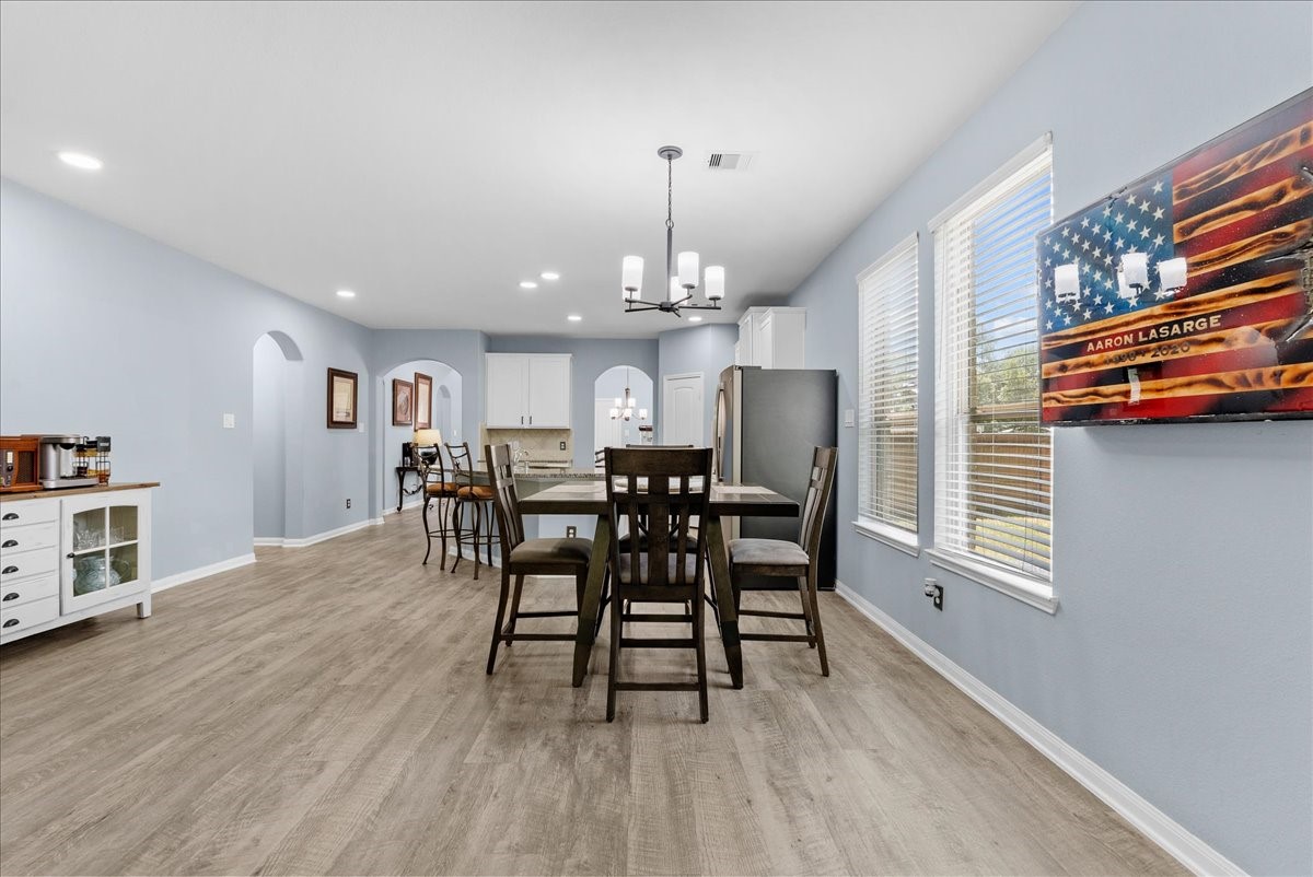 Seamless flow between the kitchen and dining spaces makes gathering with family and friends easy.
