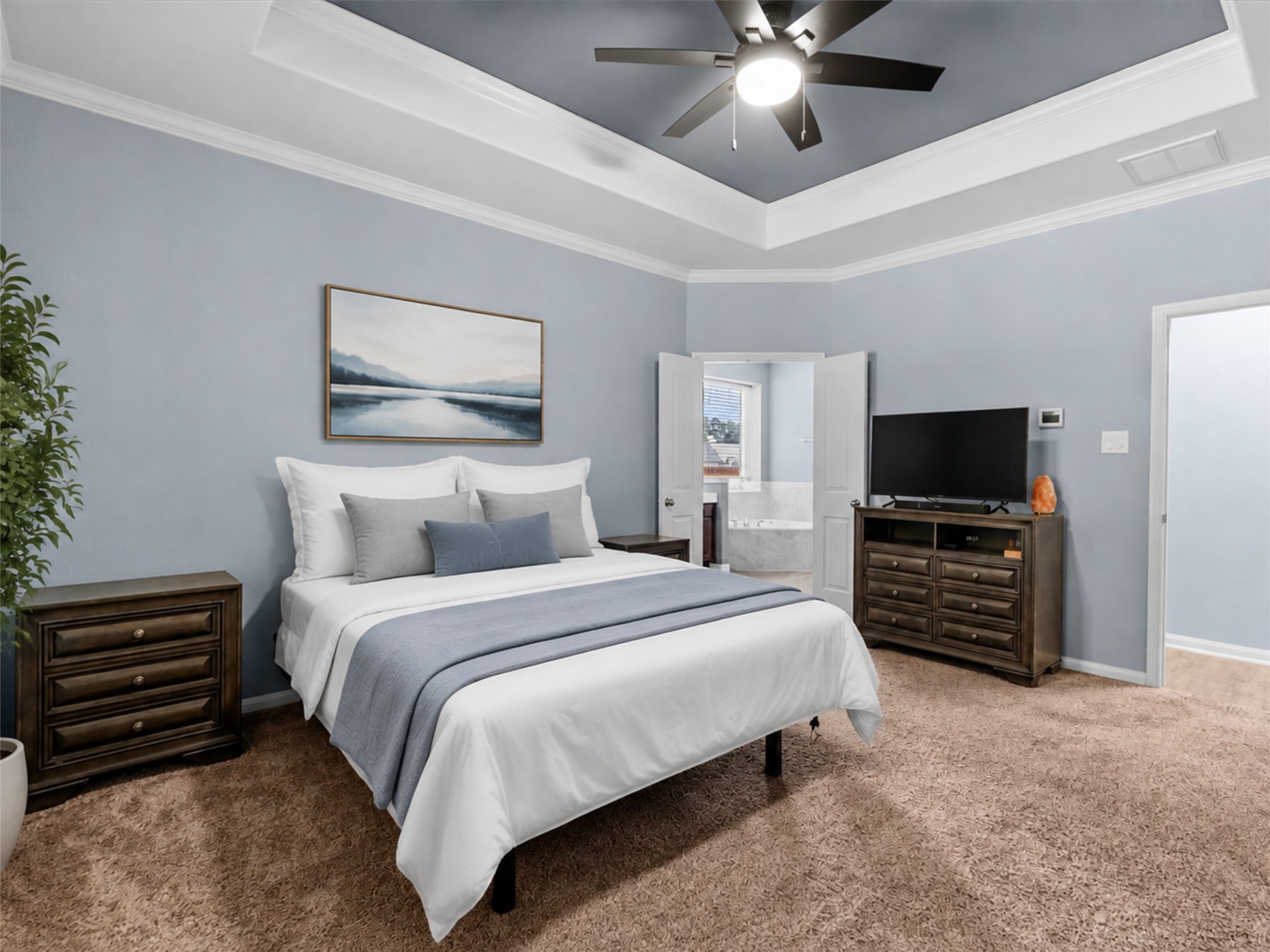 The primary suite offers a relaxing retreat with plenty of room to unwind at the end of the day.