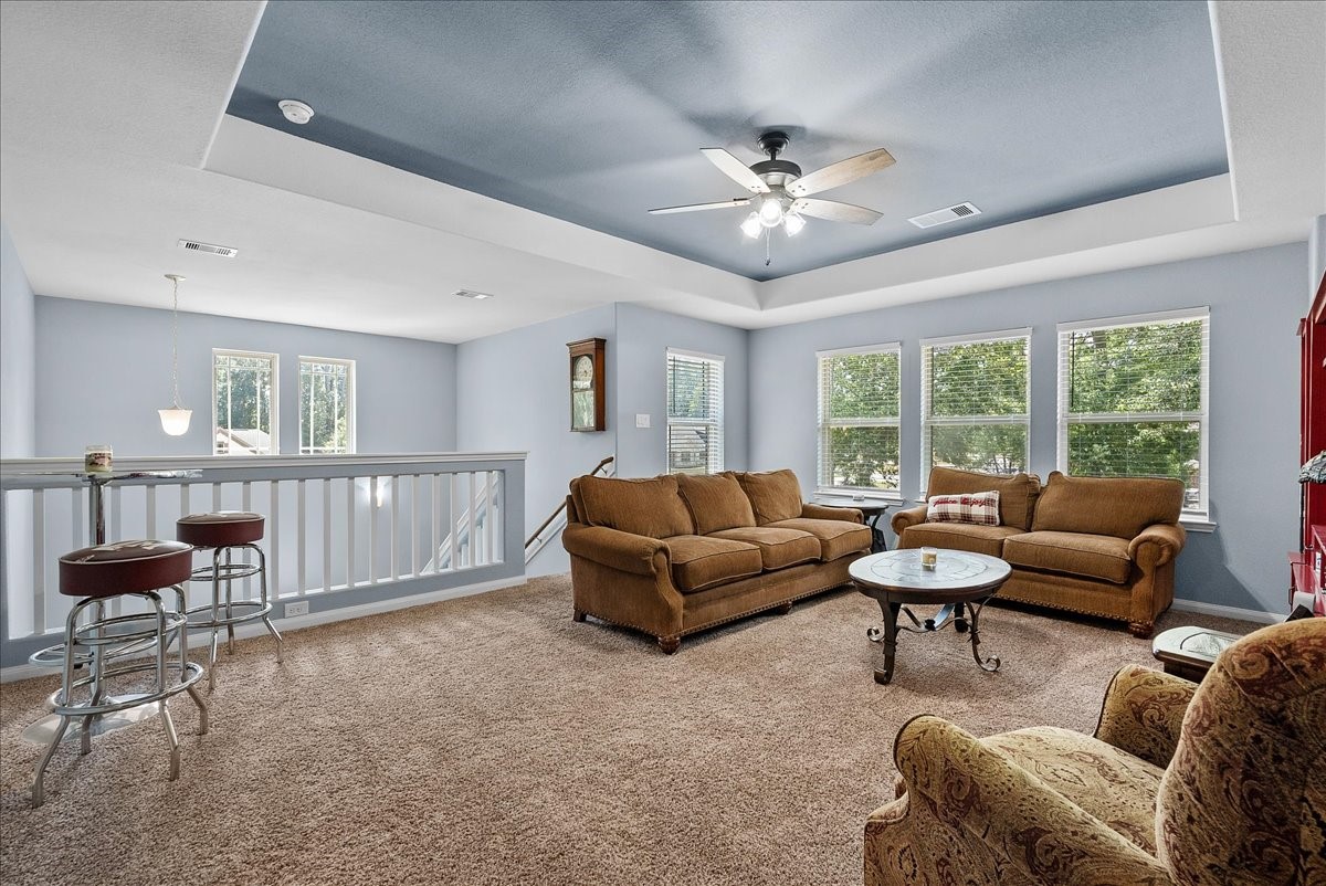 Head upstairs to a generous game room offering flexible space for movie nights, playtime, hobbies or entertaining.