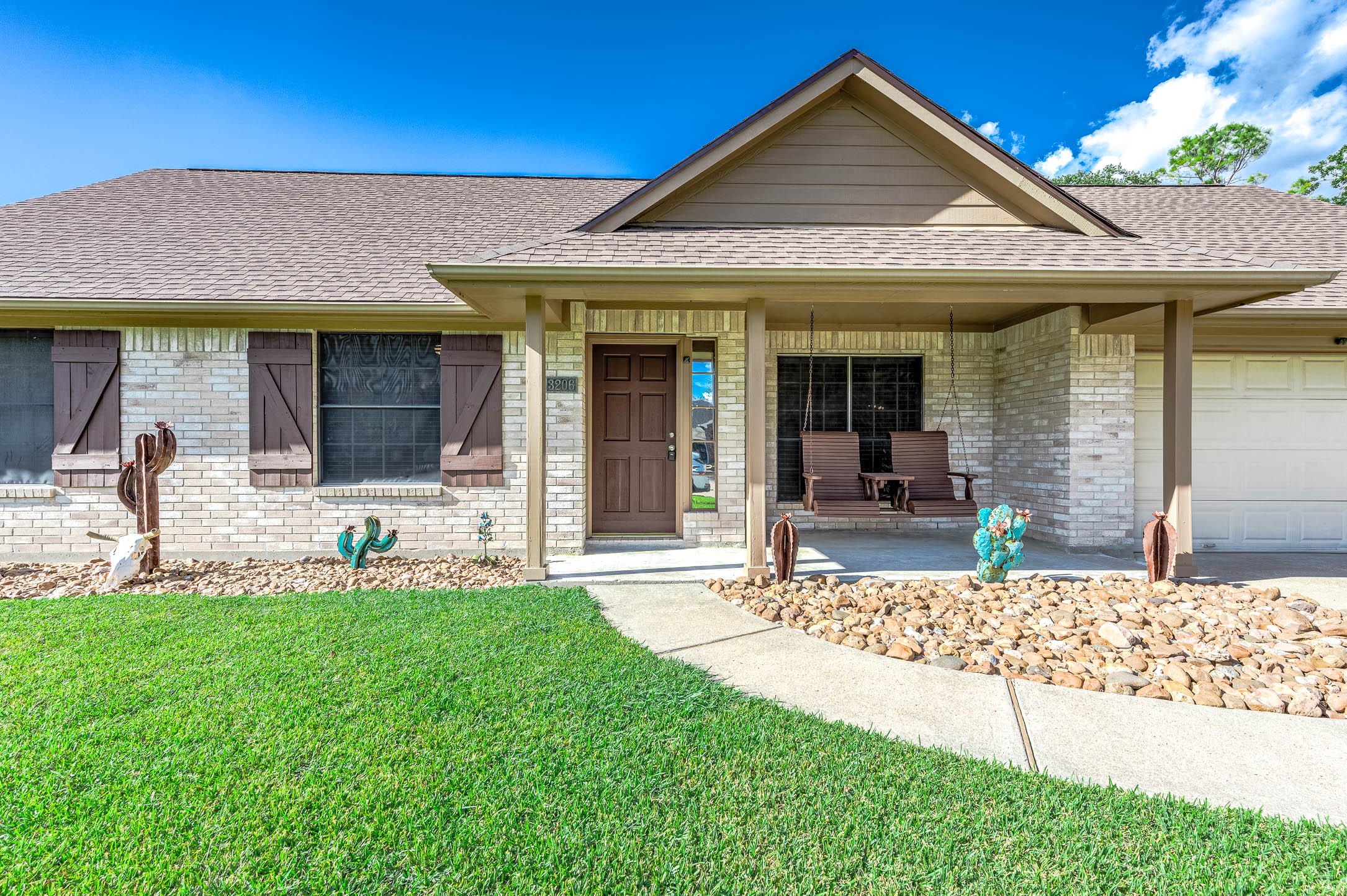 Custom shutters and landscape using stones provide a clean well maintained look! Custom shutters and landscape using stones provide a clean well maintained look!