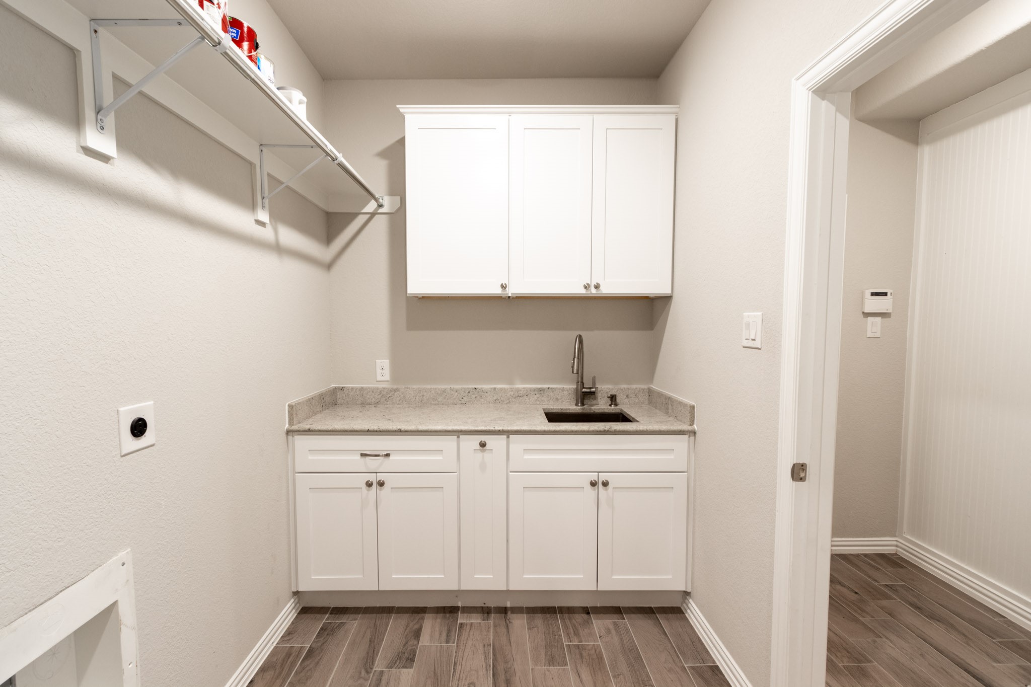 Sink and Cabinets in Laundry Room