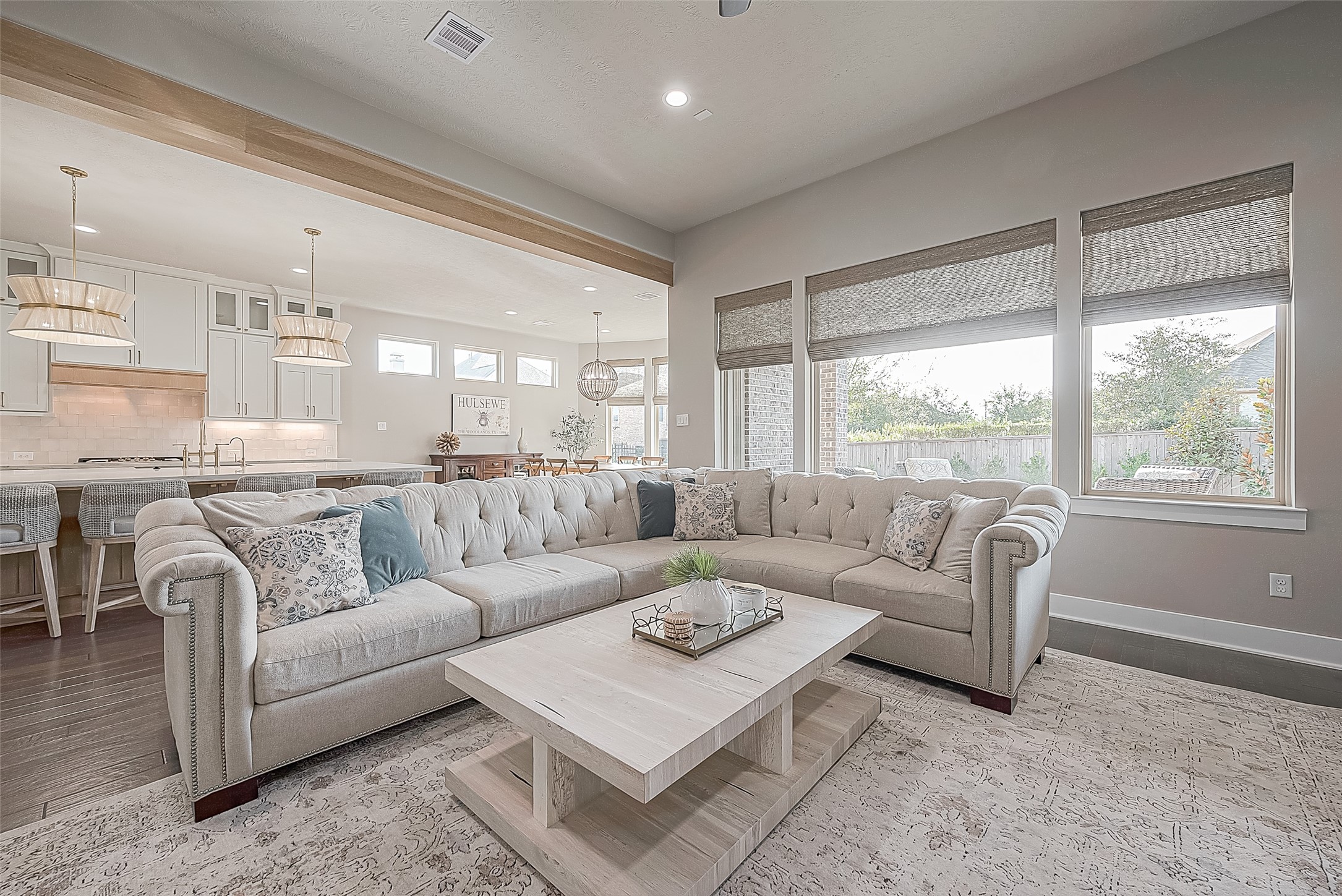 The custom window shades are adjustable for privacy.