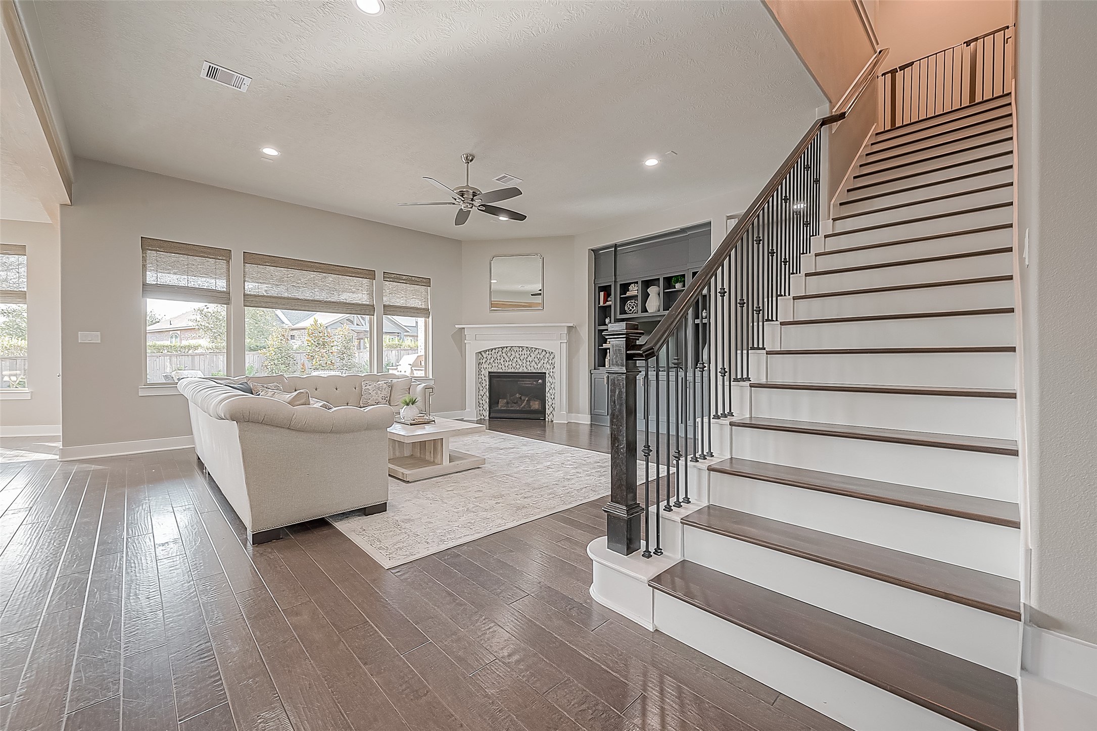 A view into the open living area - the stairs take you to the flex/game room and a half bath.