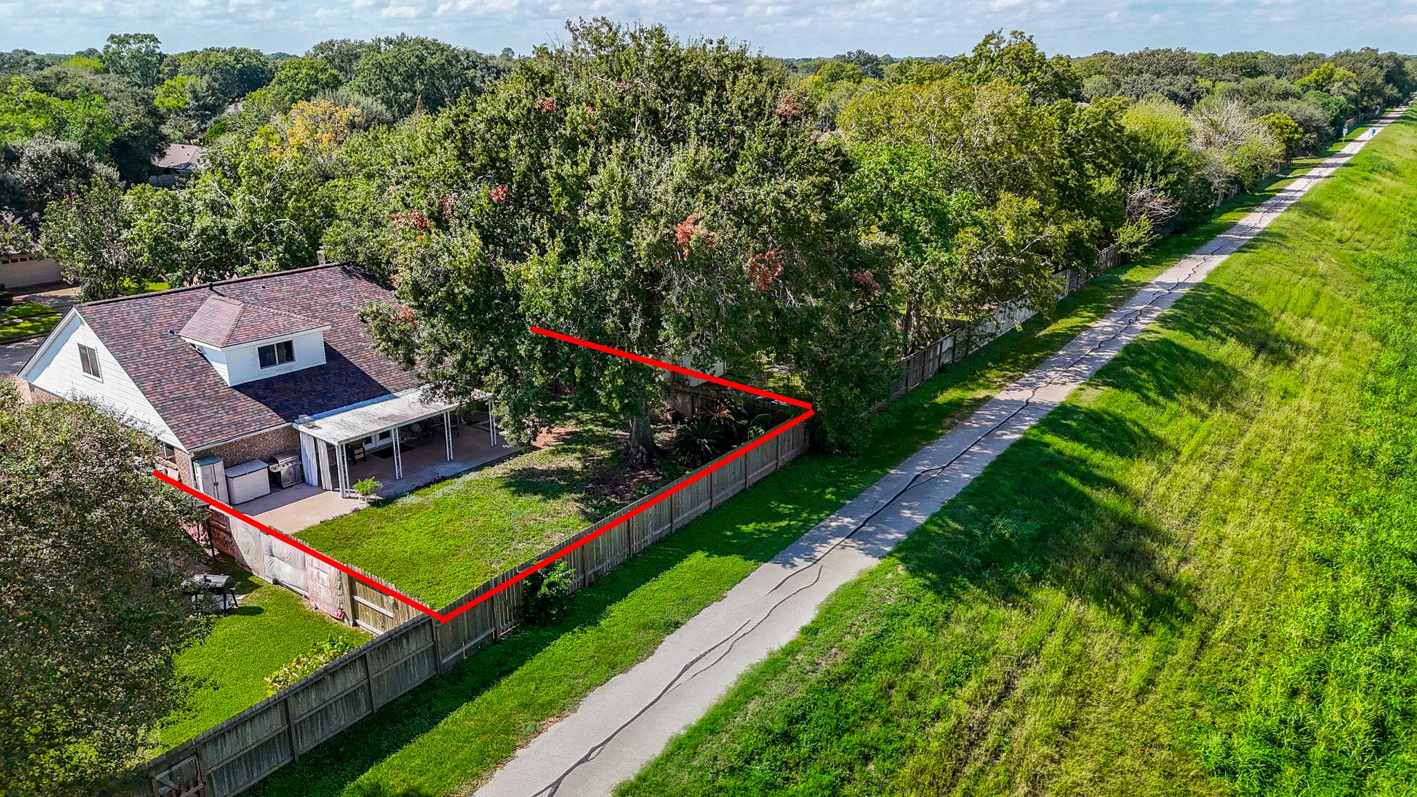 Aerial view with subject property outlined in Red. Aerial view with subject property outlined in Red.