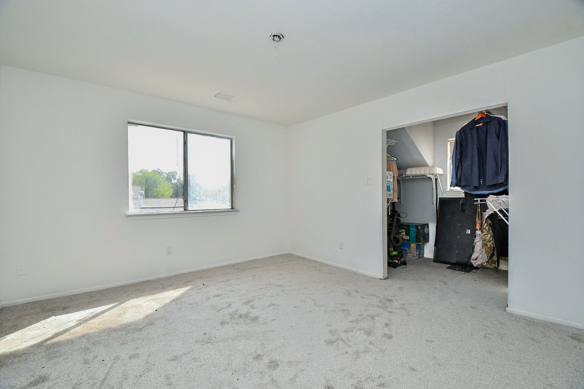 Upstairs, one of three bedrooms