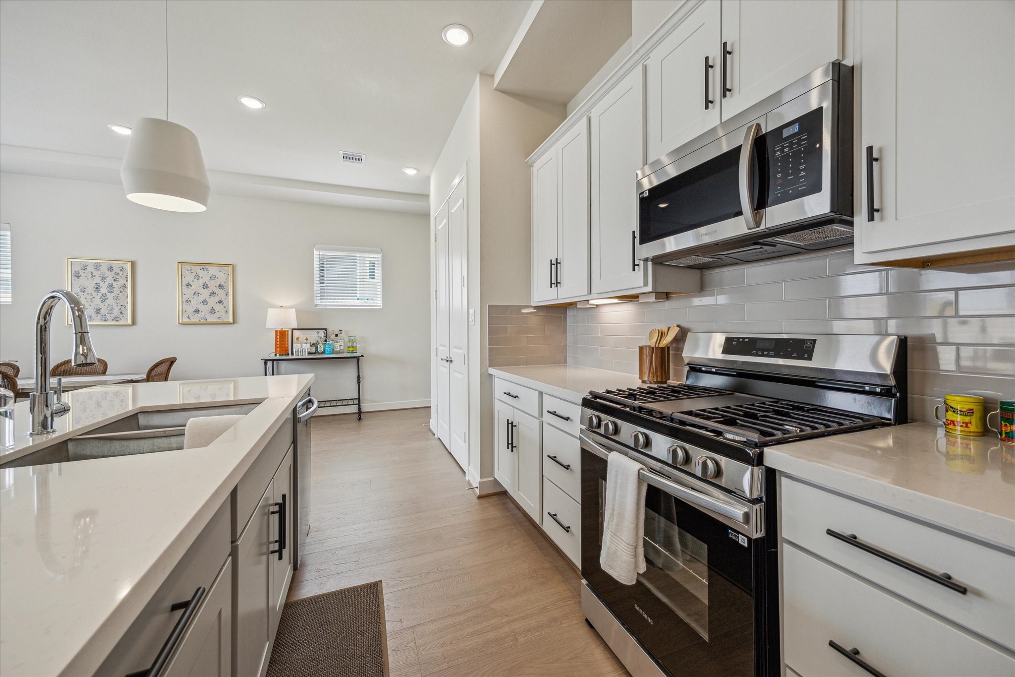 Representative photo showing the communitys model home kitchen. Layout and selections may vary.