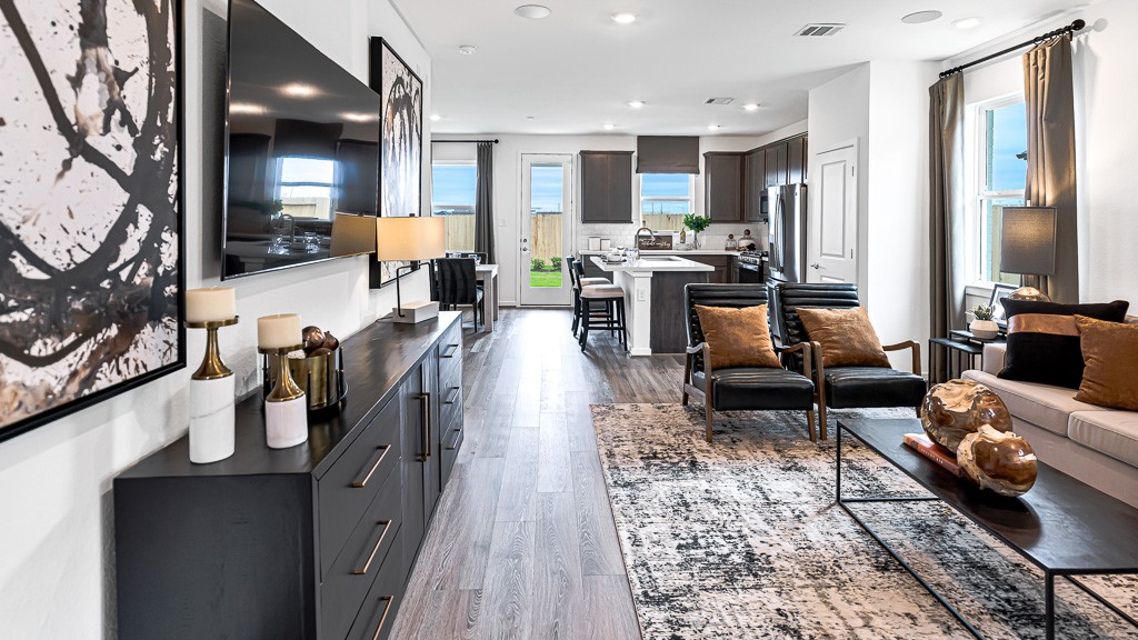 Well laid out home has a perfect place for everything including the TV/media in family room.