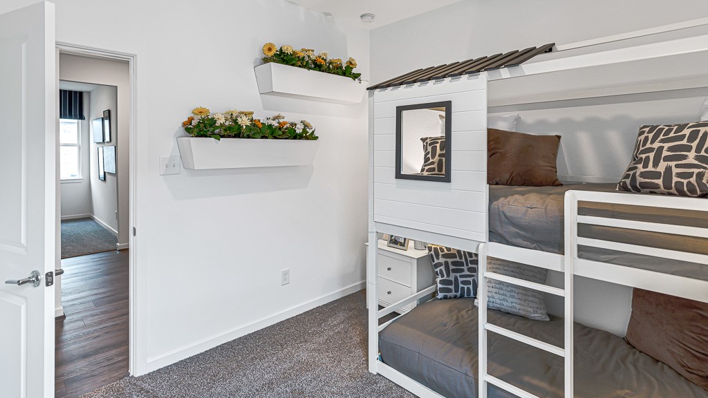 Bedroom 3 has ample space or everything and an inviting atmosphere.