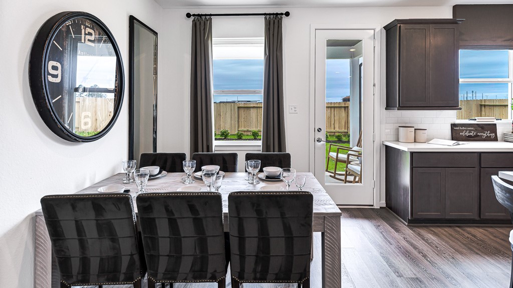 Dining room is spacious enough for large table with a seat for everyone.