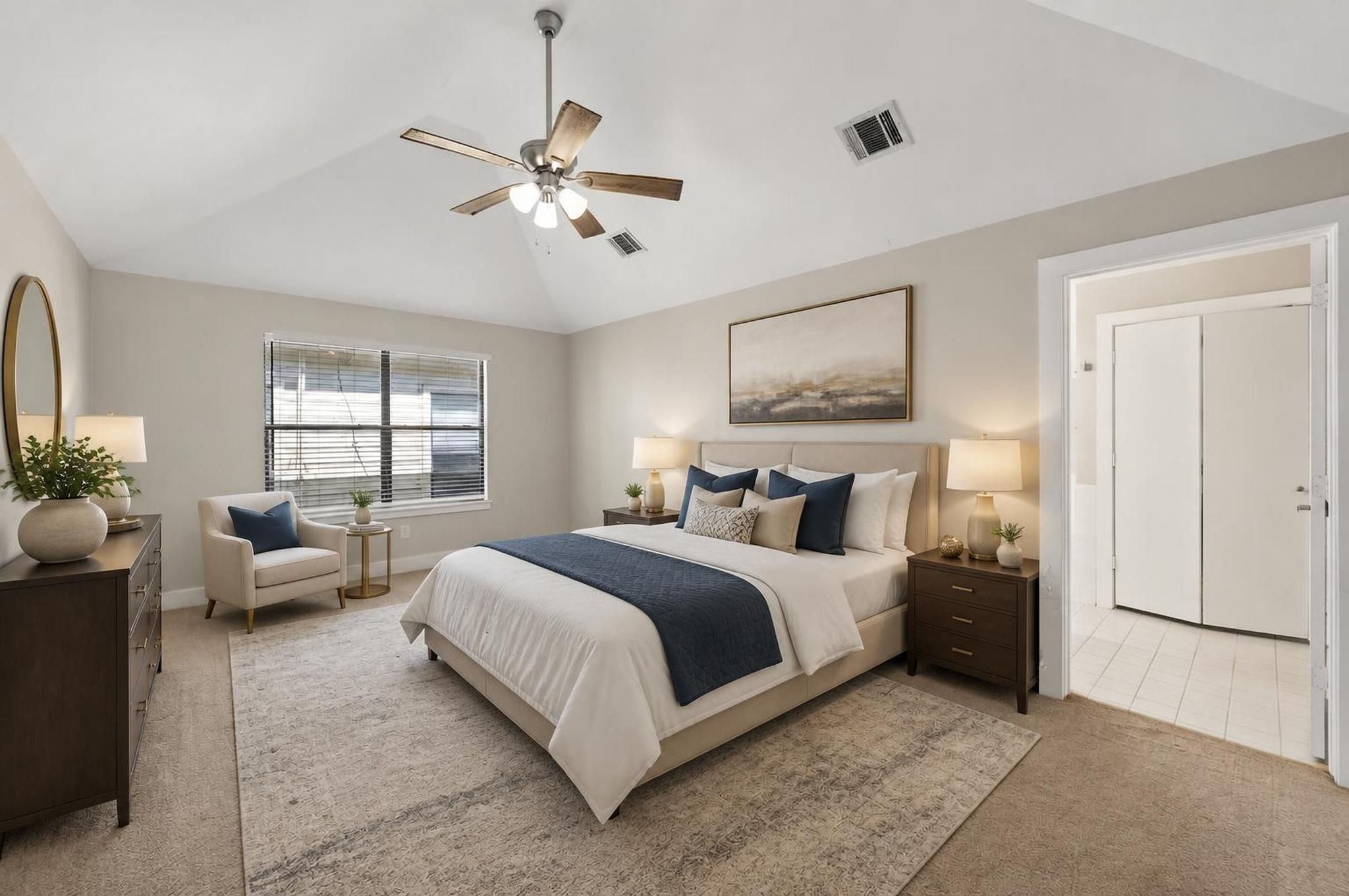 The primary suite feels spacious, private, and tucked away from the energy of the main level. It gives the top floor a peaceful, retreat-like quality. Virtually staged.