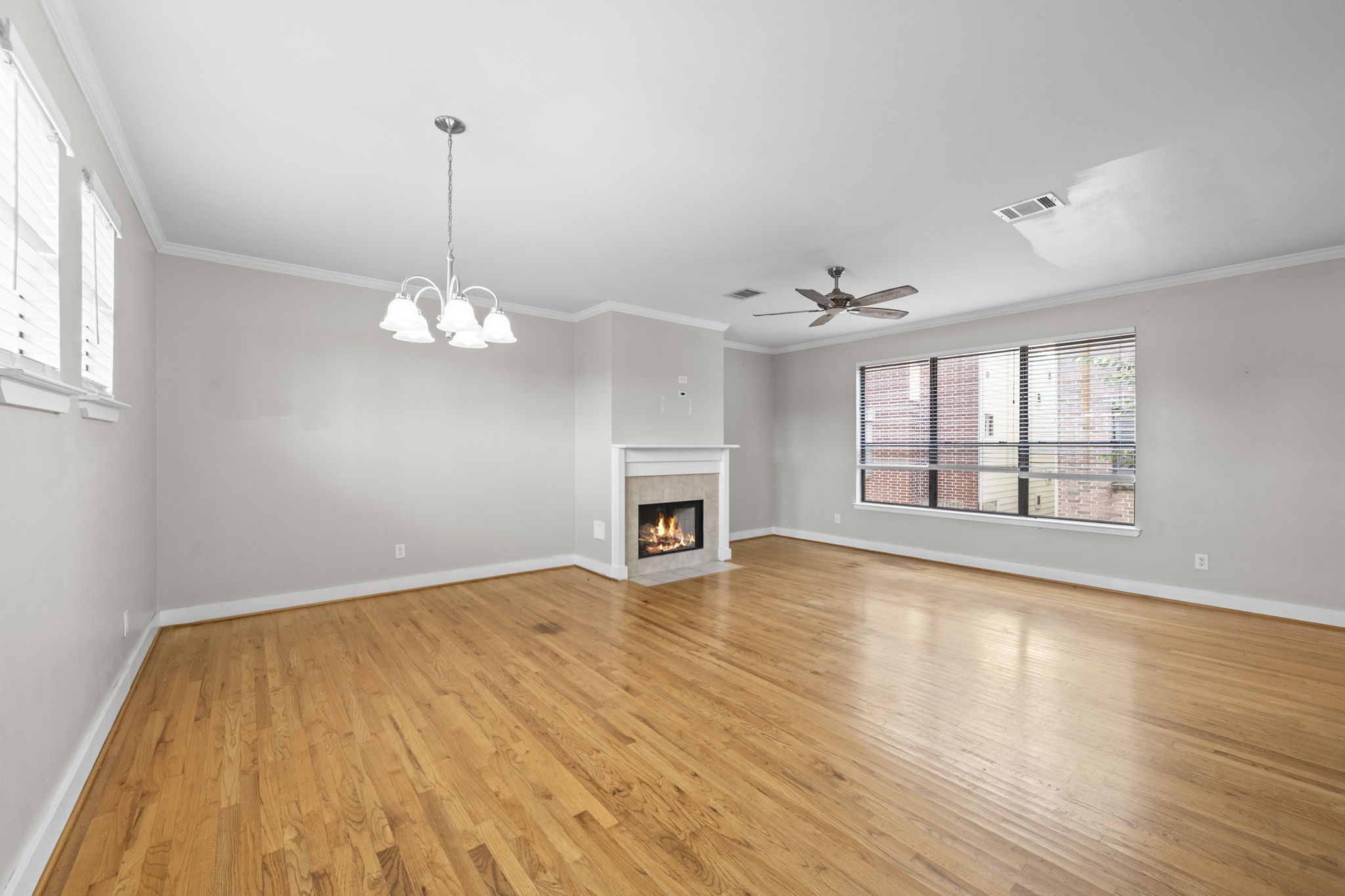 The living and dining areas flow together across the second floor, creating one open and connected gathering space. The layout allows the home to feel spacious, social, and easy to enjoy.