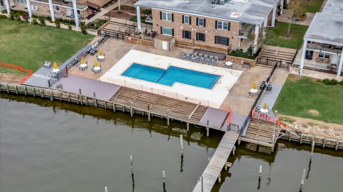 This serene saltwater pool, located at the back of the community, is the perfect spot to relax and unwind.