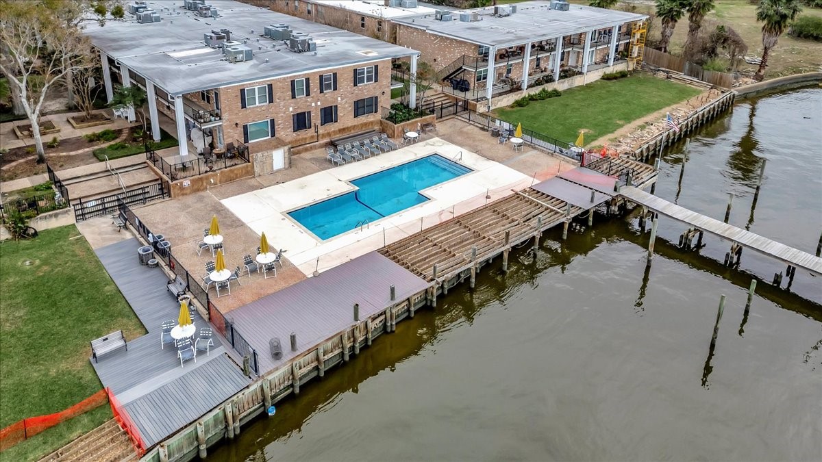 Relax by the saltwater pool with fantastic views of the surrounding waterfront and enjoy all this community has to offer.