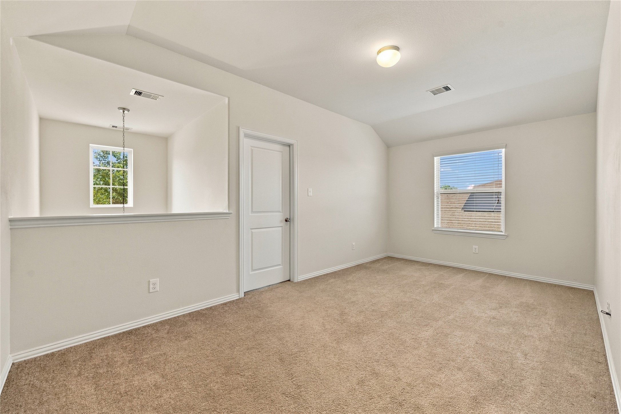 Spacious flex room leading to first upstairs bedroom, let your creativity run wild!