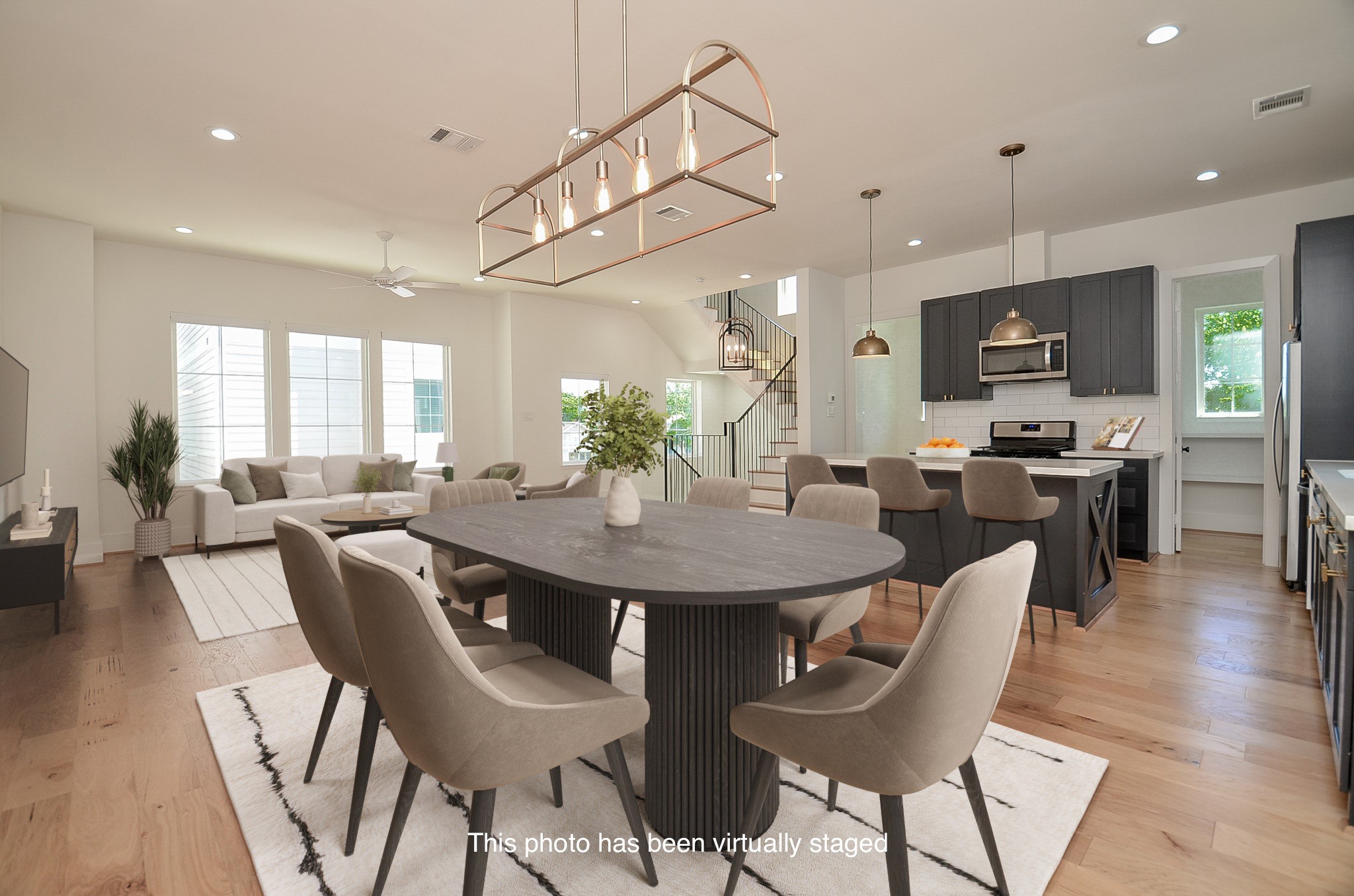 Kitchen storage combines cabinetry, open shelving, and an adjacent walk-in pantry.