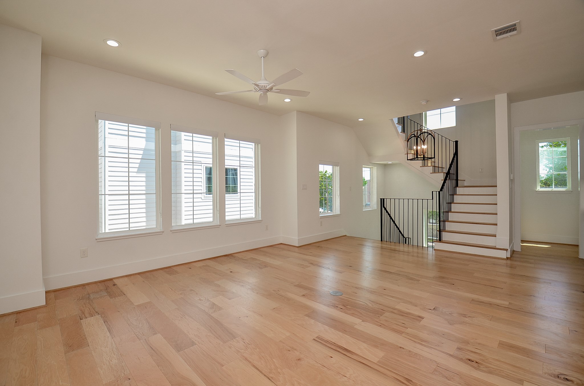 Large windows bring natural light into the main gathering space.