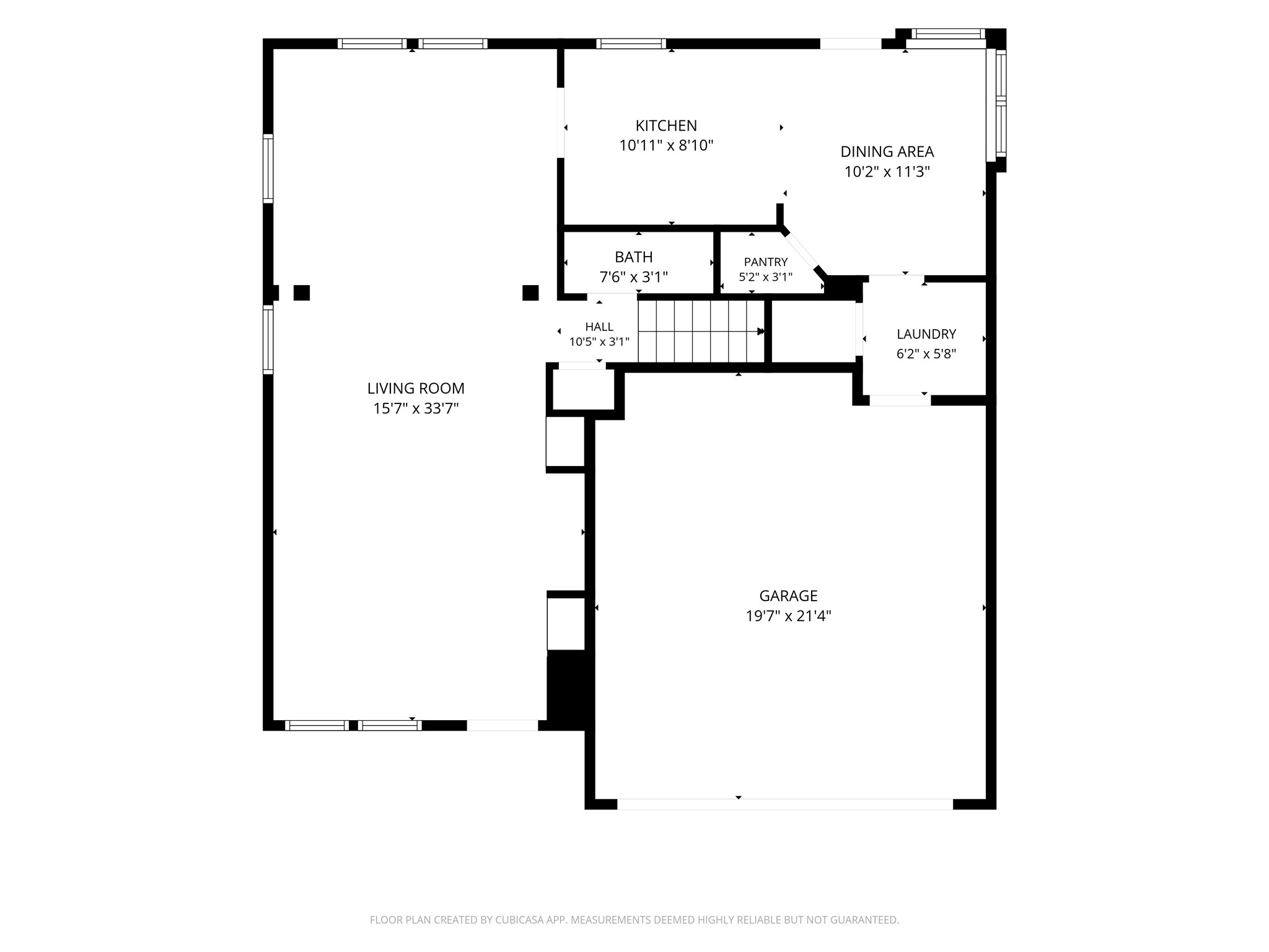 Spacious open floor plan featuring a large living room, modern kitchen with adjacent dining area, convenient laundry room, and a generous garage.