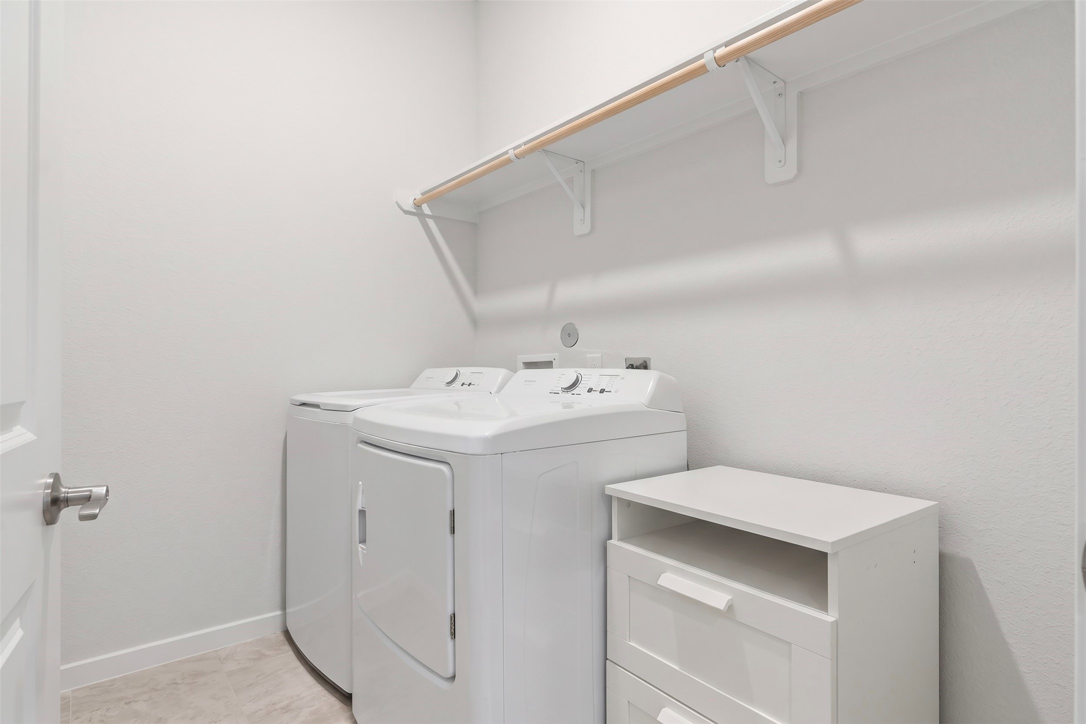 Utility room with extra space for storage or second refrigerator.