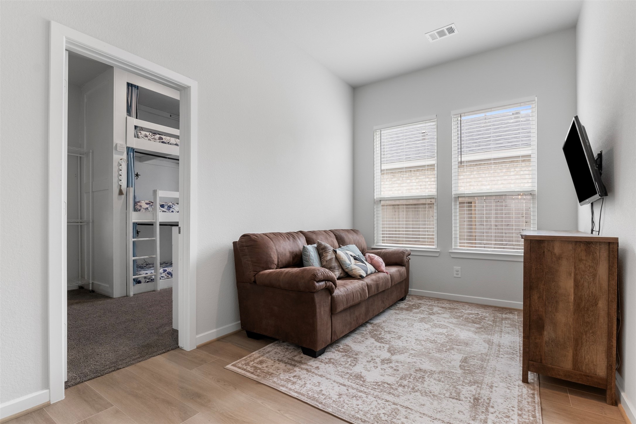 A movie night spot, a hangout zone or a quiet reading nook: this flexible game room is adaptable.