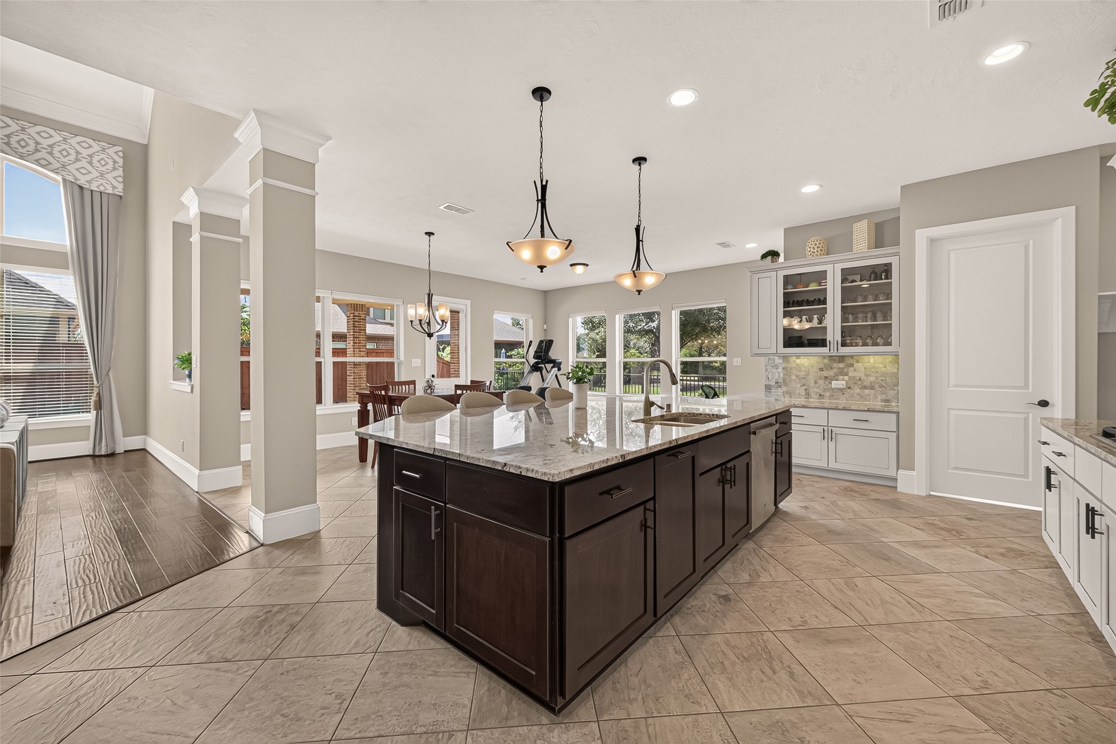 Amazing Chefs Kitchen with granite countertops, SS Appliances, Double Oven, Walk-In Pantry and Large Island overlooking Breakfast nook and Lake