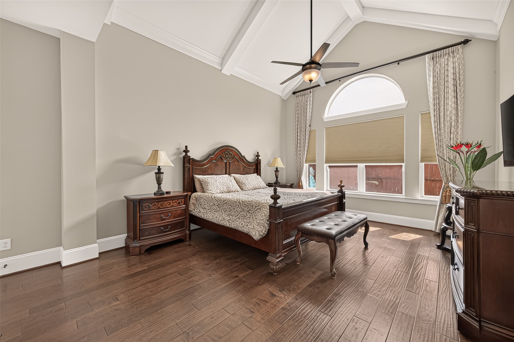 Primary Bedroom with oversized, vaulted ceilings