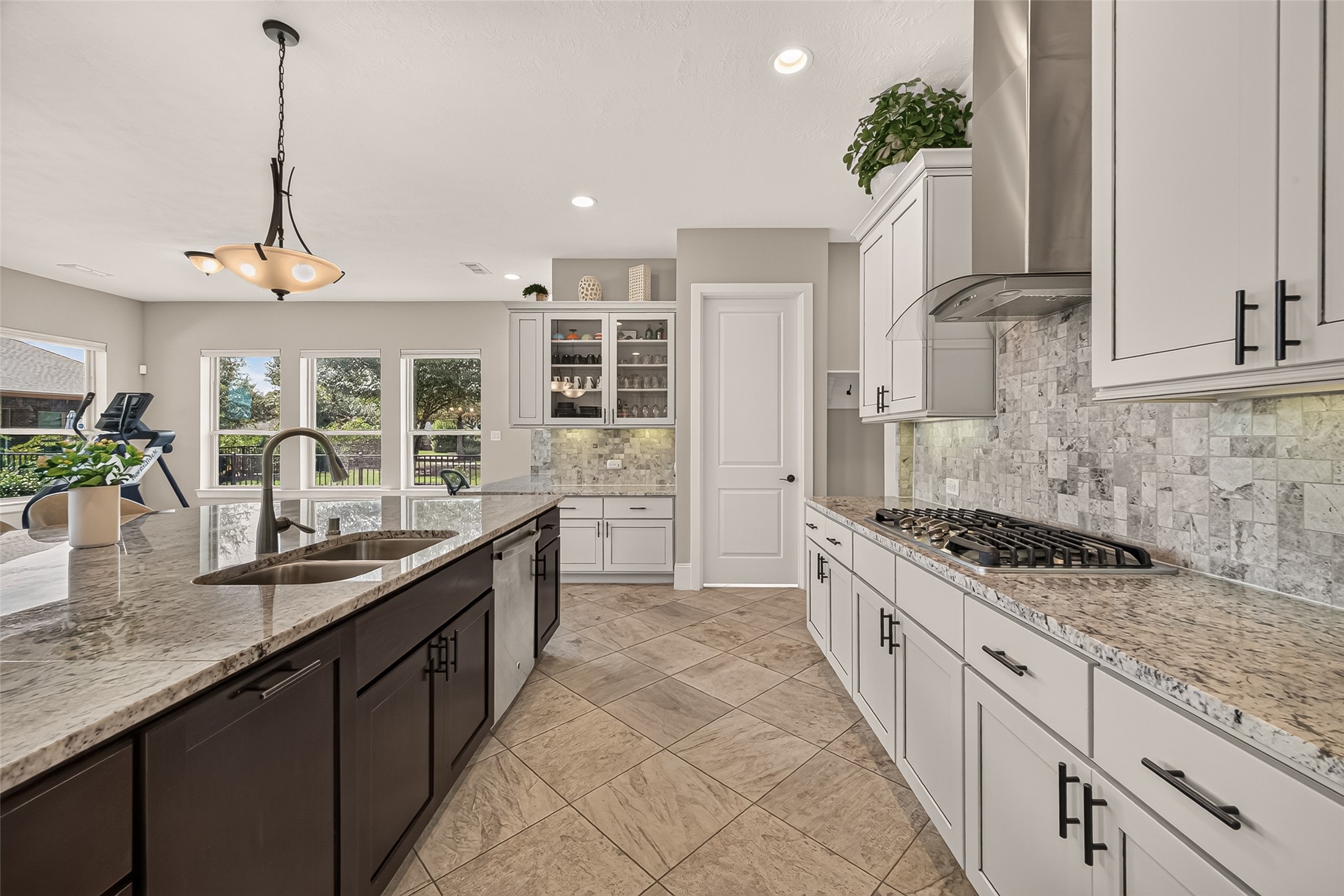 Amazing Chefs Kitchen with granite countertops, SS Appliances, Double Oven, Walk-In Pantry and Large Island overlooking Breakfast nook and Lake