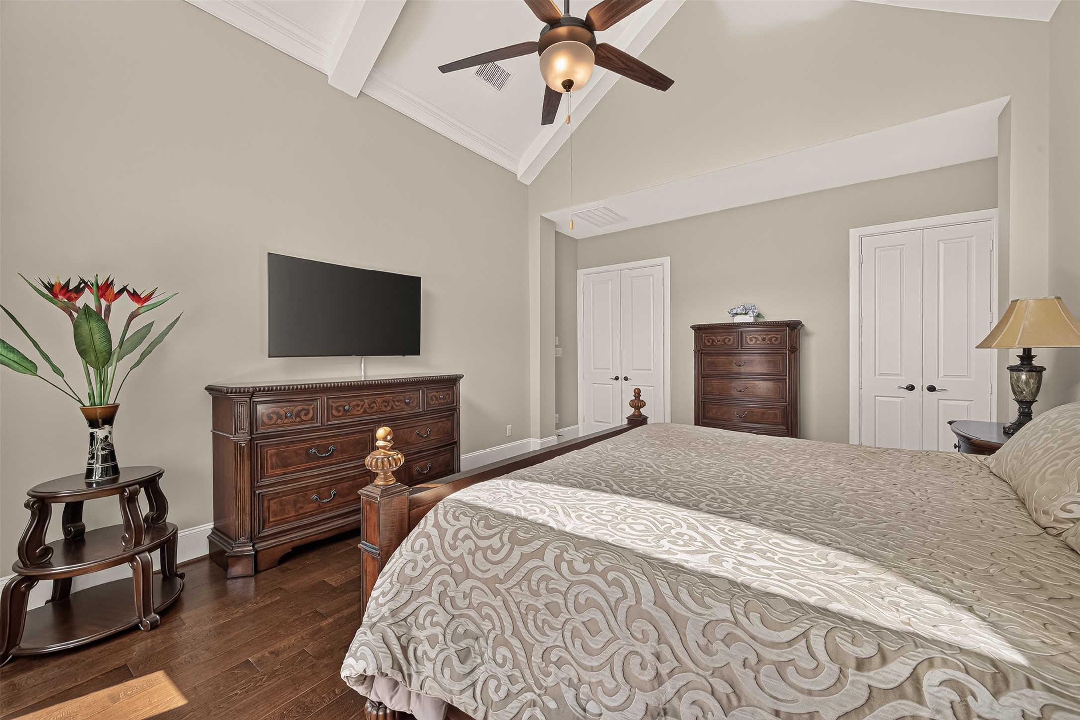 Primary Bedroom with oversized, vaulted ceilings